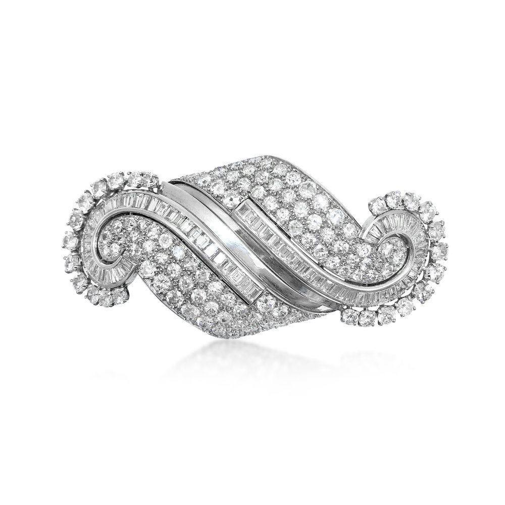 A DIAMOND AND PLATINUM DOUBLE CLIP BROOCH, BY RENE BOIVIN, CIRCA 1933 - SOLD