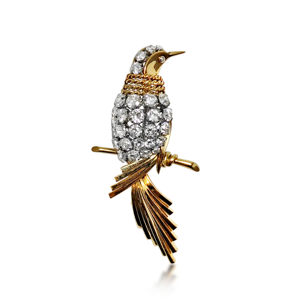 A RETRO DIAMOND AND 18K GOLD BIRD BROOCH, CIRCA 1950S - SOLD