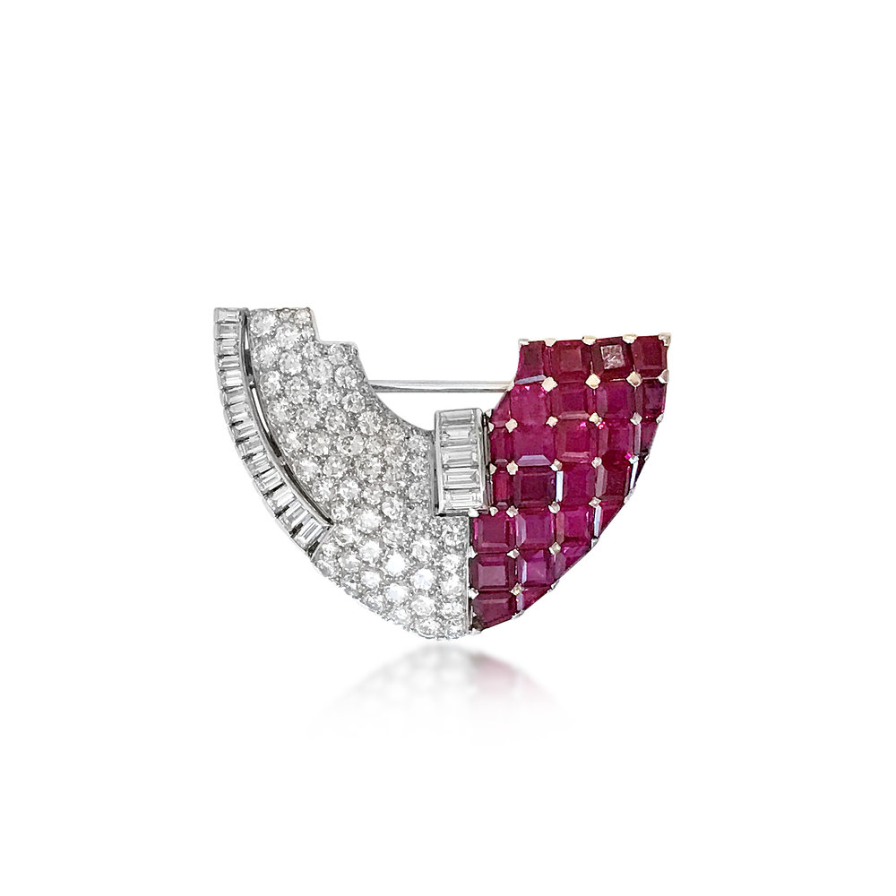 A RUBY AND DIAMOND CLIP BROOCH, BY VERDURA, CIRCA 1955 - SOLD