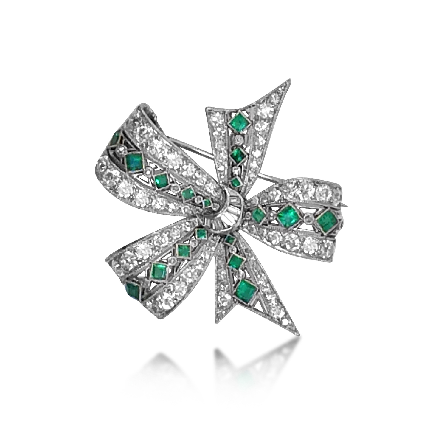 AN EDWARDIAN EMERALD AND DIAMOND BOW BROOCH, CIRCA 1918 - SOLD