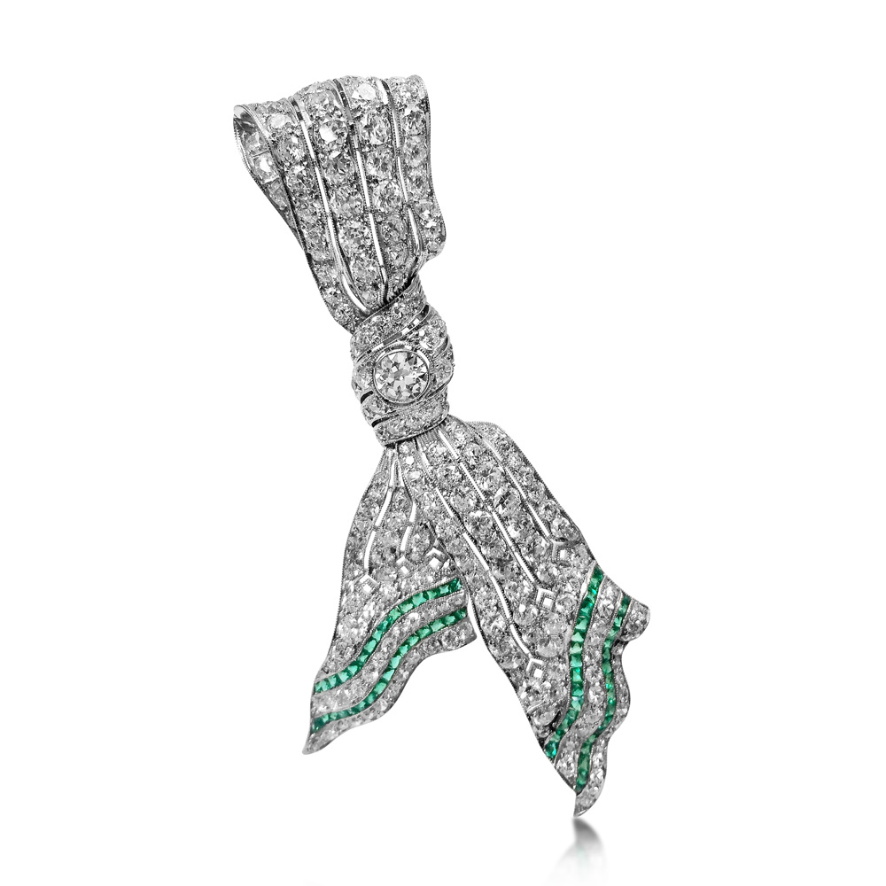 AN ART DECO DIAMOND AND EMERALD BROOCH, BY MARCUS &amp; CO., CIRCA 1925 - SOLD