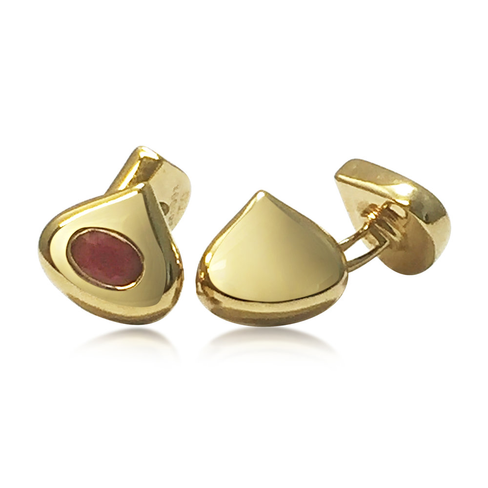 A Pair of Gold and Ruby Cufflinks, by Chaumet  