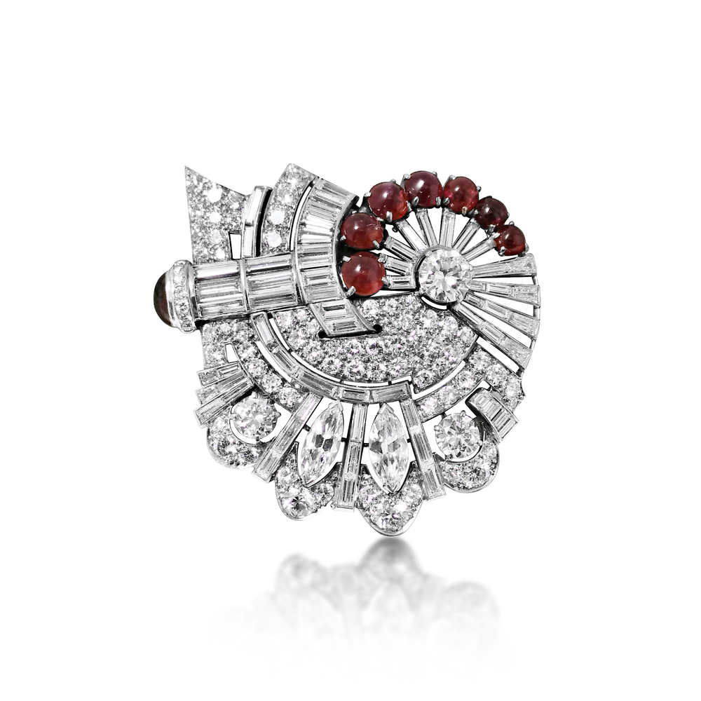 A DIAMOND AND RUBY CABOCHON BROOCH, CIRCA 1950’S - SOLD