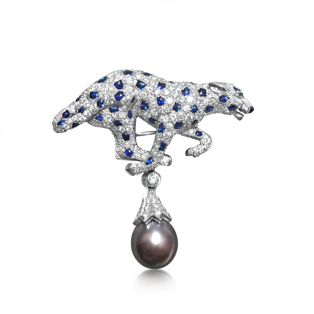 A GEM-SET 'PANTHERE' PENDANT/BROOCH, BY CARTIER - SOLD