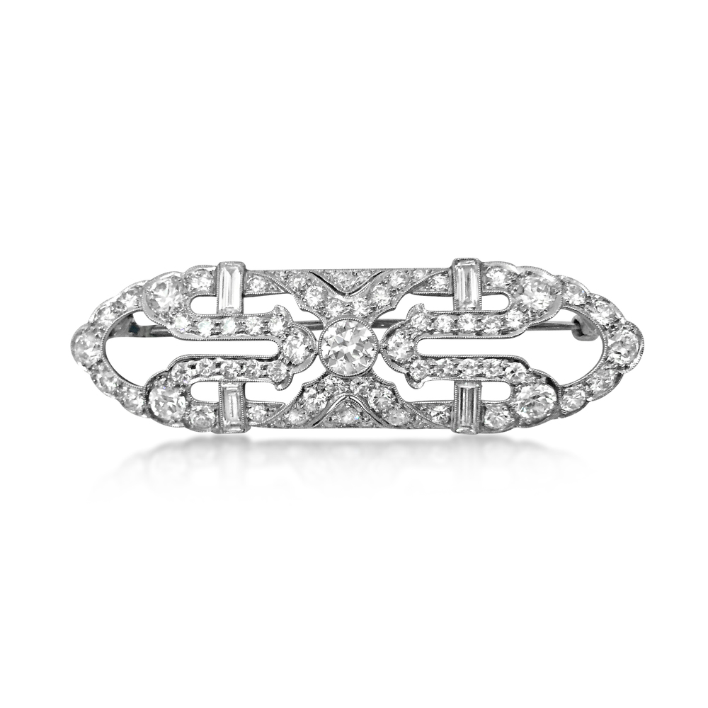 AN ART DECO DIAMOND AND PLATINUM BROOCH, BY TIFFANY &amp; CO., CIRCA 1920 - SOLD