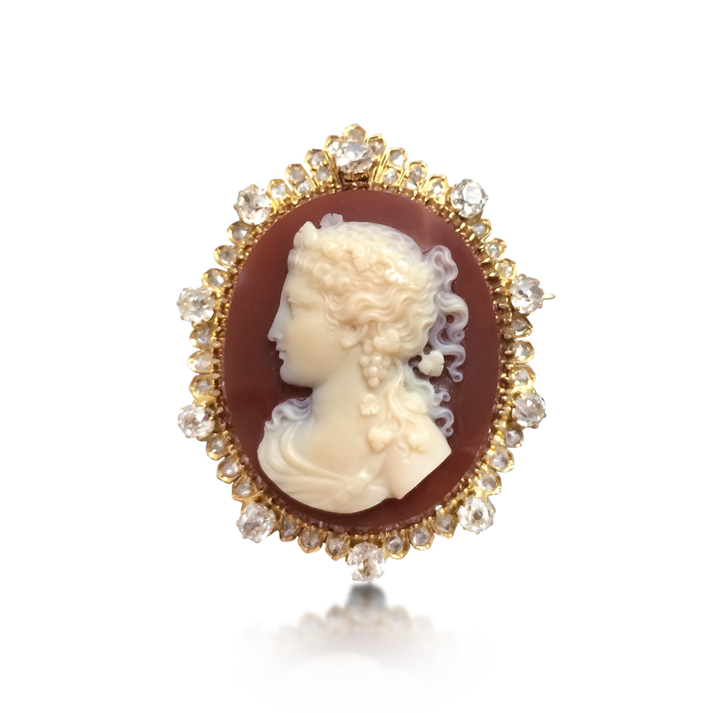 AN ANTIQUE HARDSTONE CAMEO AND DIAMOND BROOCH/PENDANT. CIRCA 1850S. - SOLD