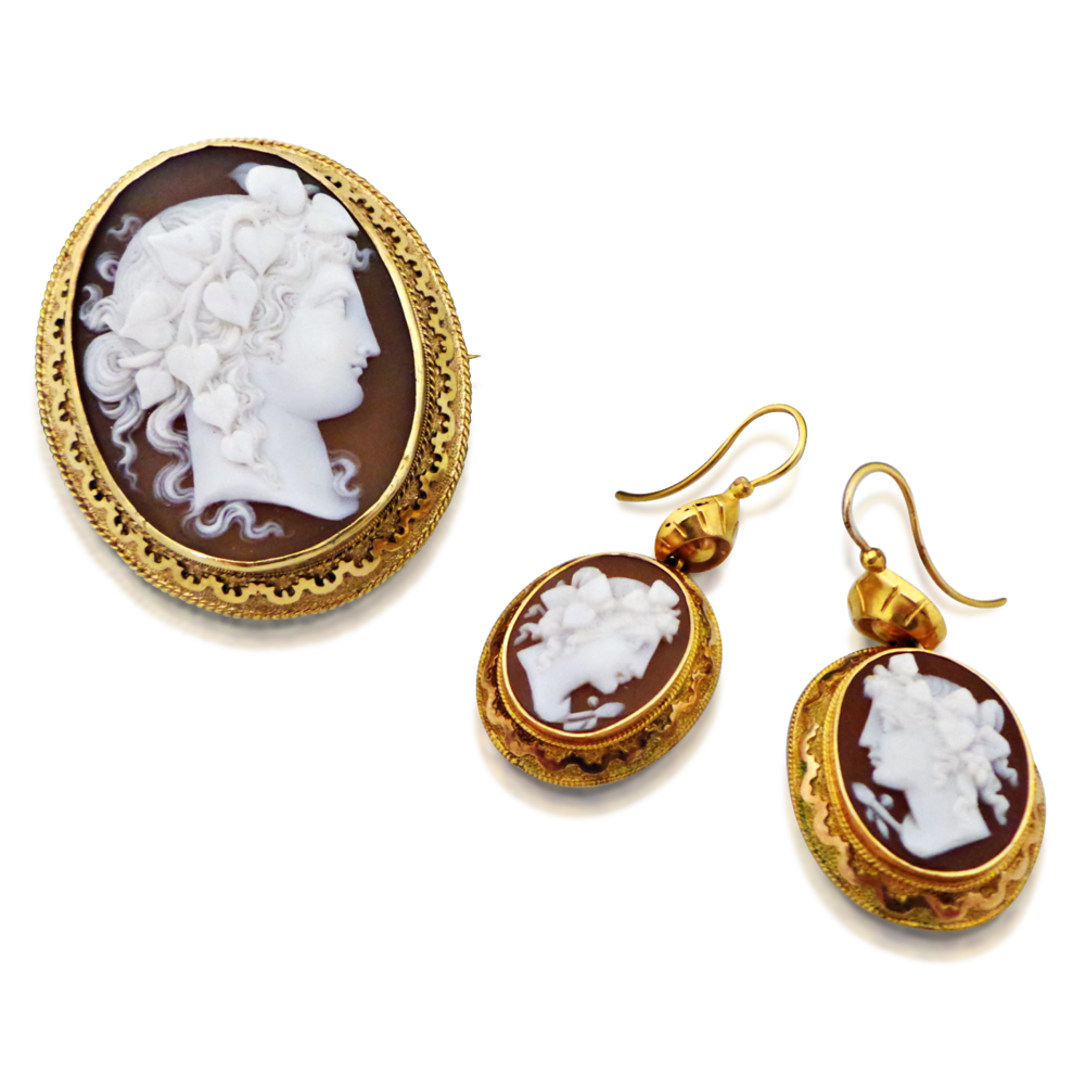 AN ANTIQUE SHELL CAMEO AND GOLD BROOCH AND EARRINGS SET, CIRCA 1870 - SOLD