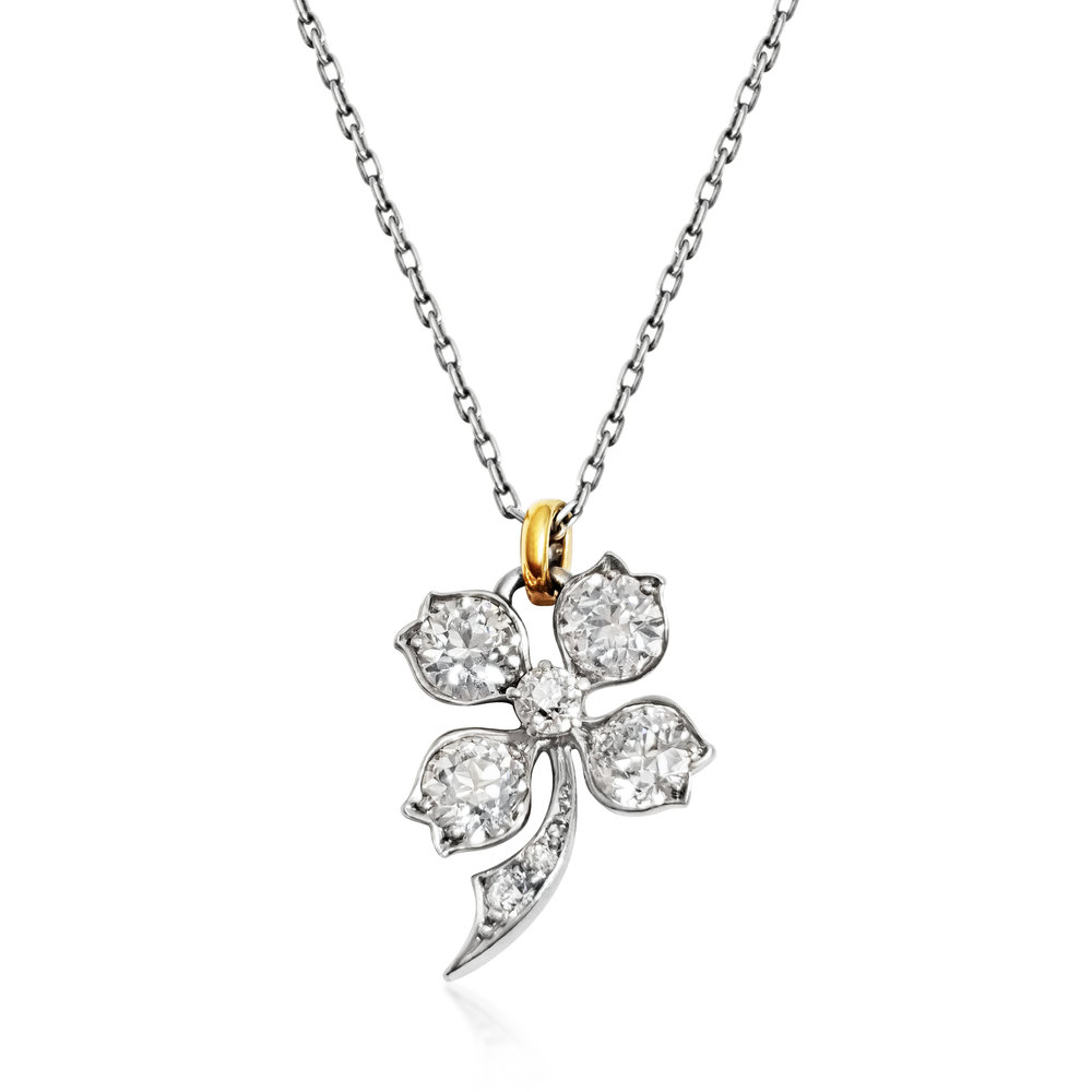 A DIAMOND, PLATINUM AND GOLD 'CLOVER' PENDANT WITH CHAIN, BY TIFFANY &amp; CO.