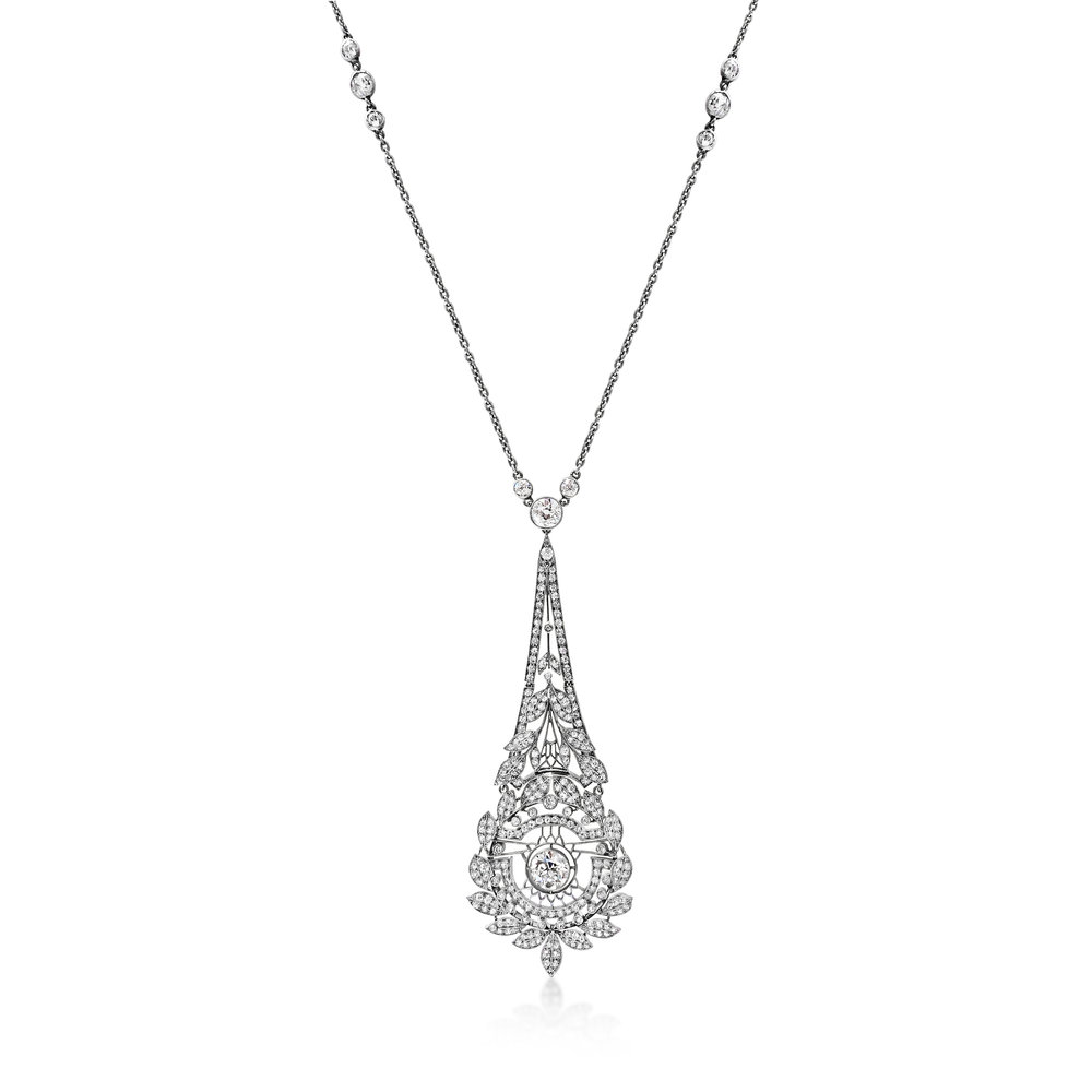 AN EDWARDIAN PLATINUM AND DIAMOND PENDANT