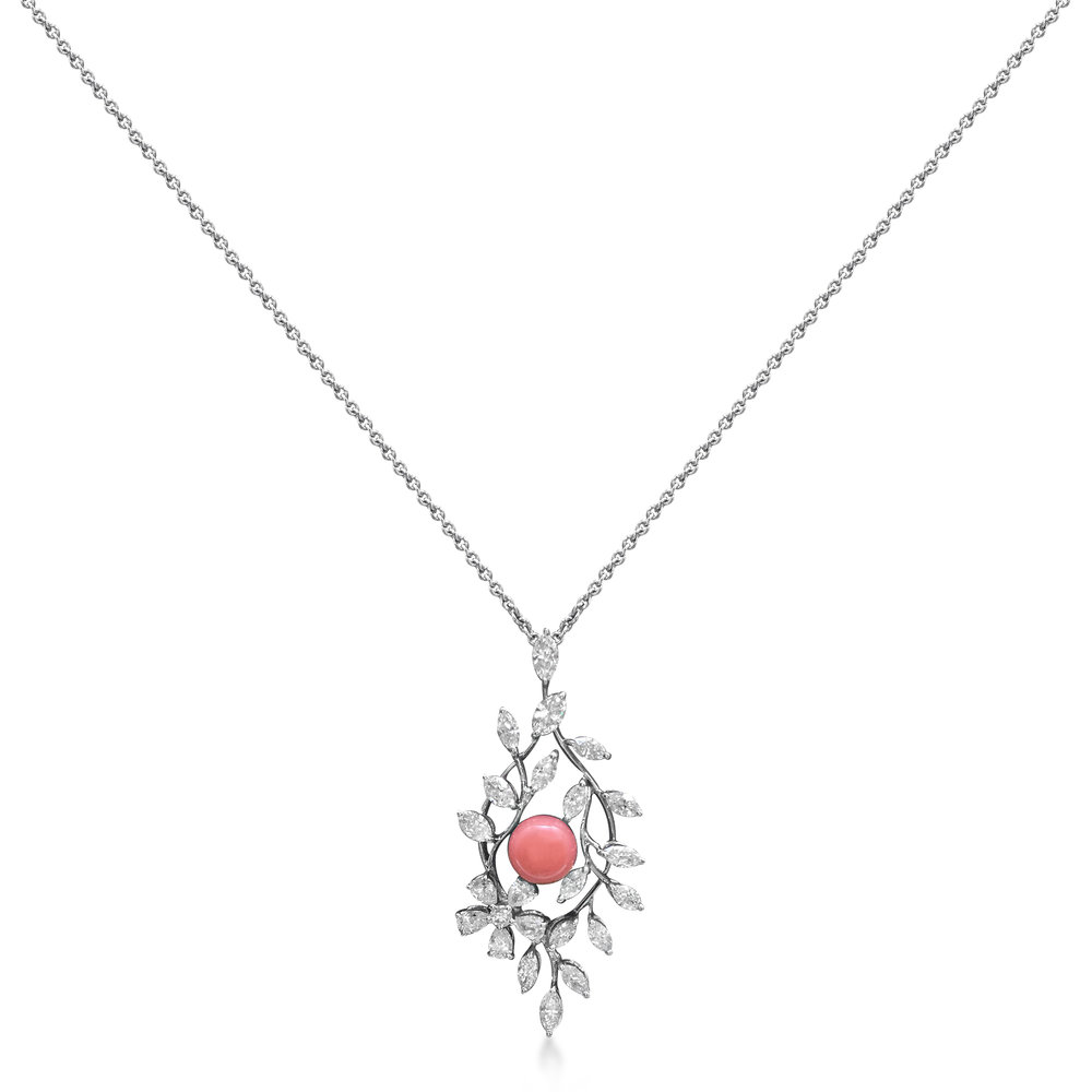 A CONCH PEARL AND DIAMOND PENDANT, BY MIKIMOTO 