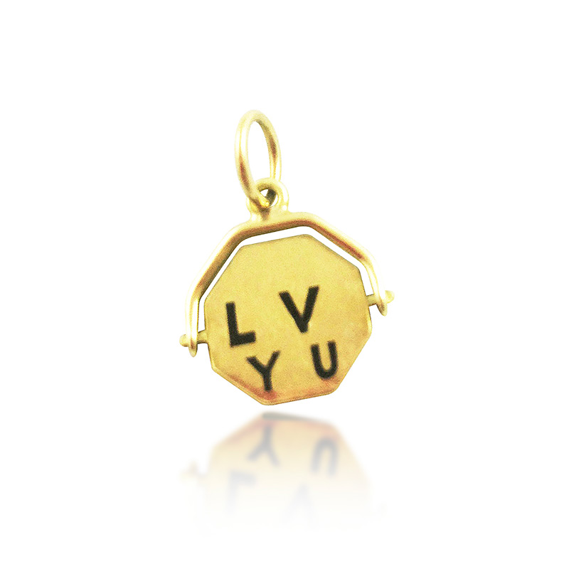 AN ART DECO 14K GOLD " I LOVE U" SPIN CHARM, CIRCA 1950S 