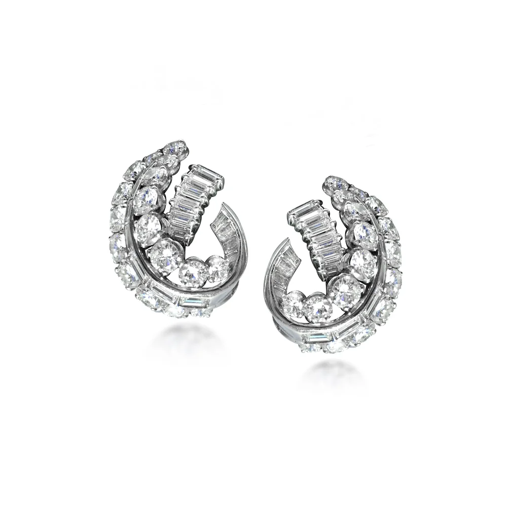 EA63%3A010216_HUM_A+Pair+of+Brilliant+and+Baguete-cut+Diamond+Earclips+of+Scrolled+Leaf+Design+2.jpg