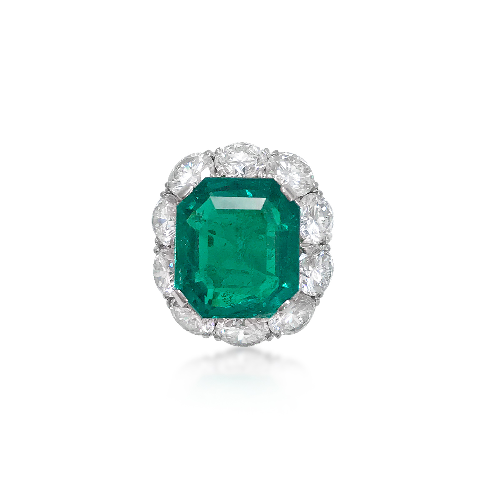 An Emerald And Diamond Ring  