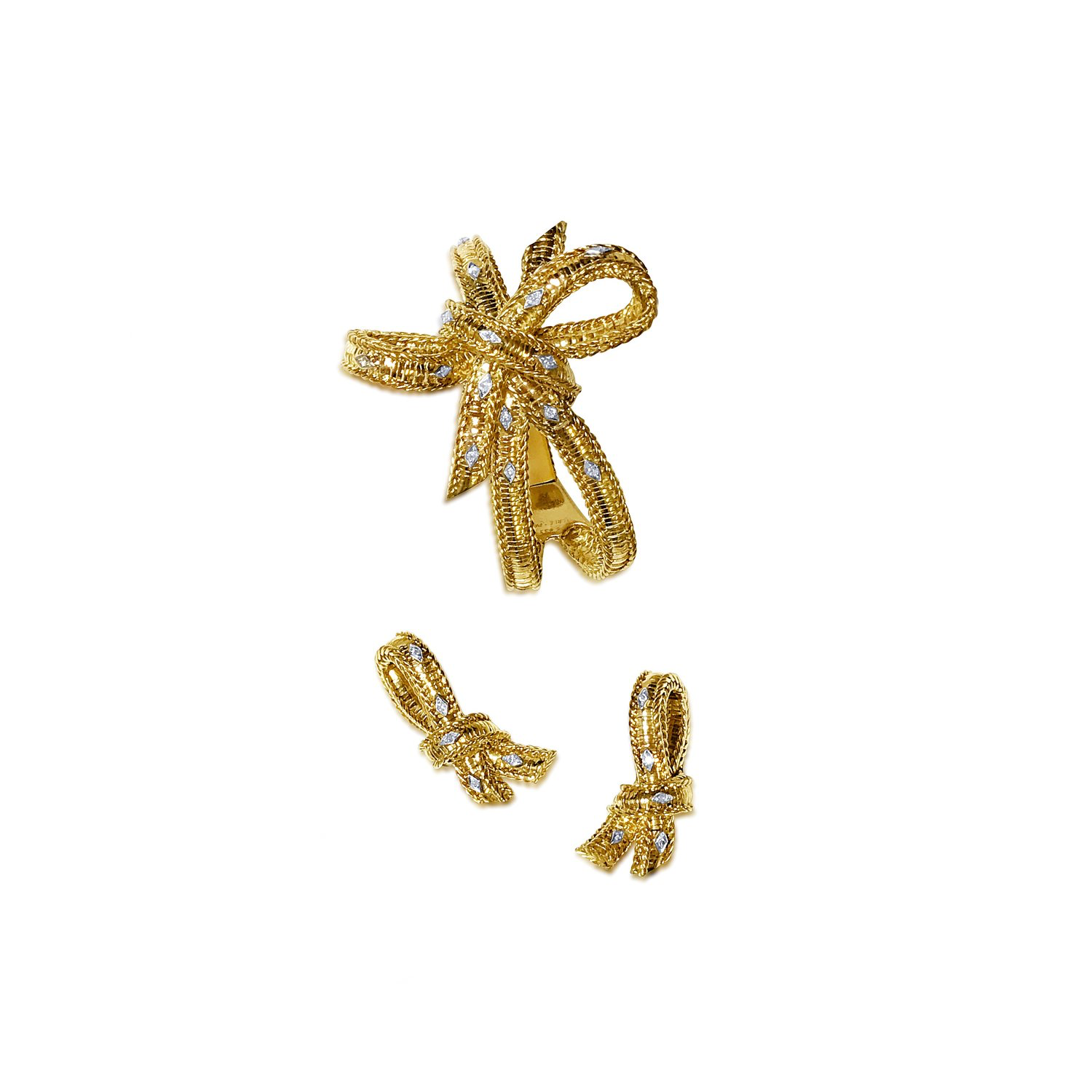 A SET OF 18 KARAT GOLD AND DIAMOND JEWELRY, STERLÉ PARIS, CIRCA 1950  