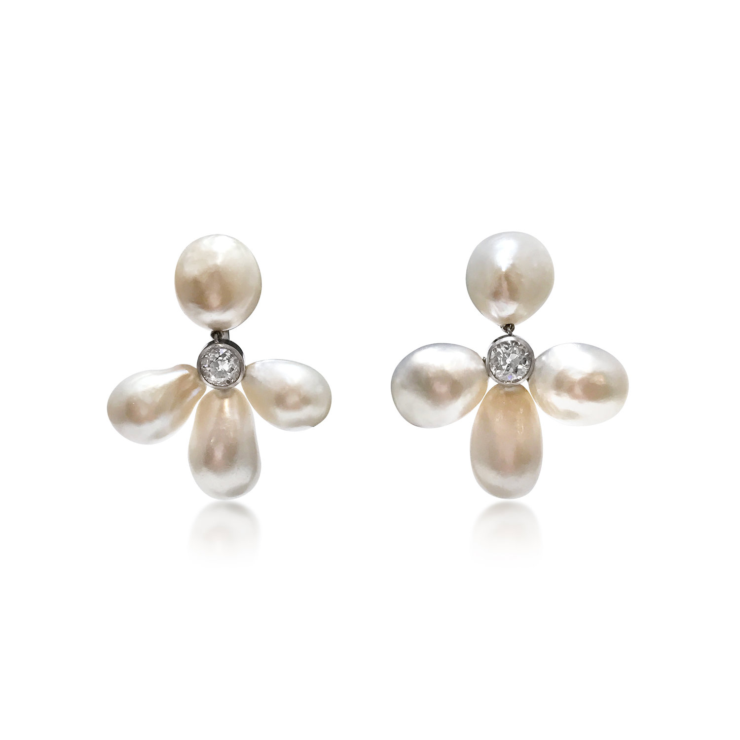 A PAIR OF PEARL AND DIAMOND EAR CLIPS - SOLD