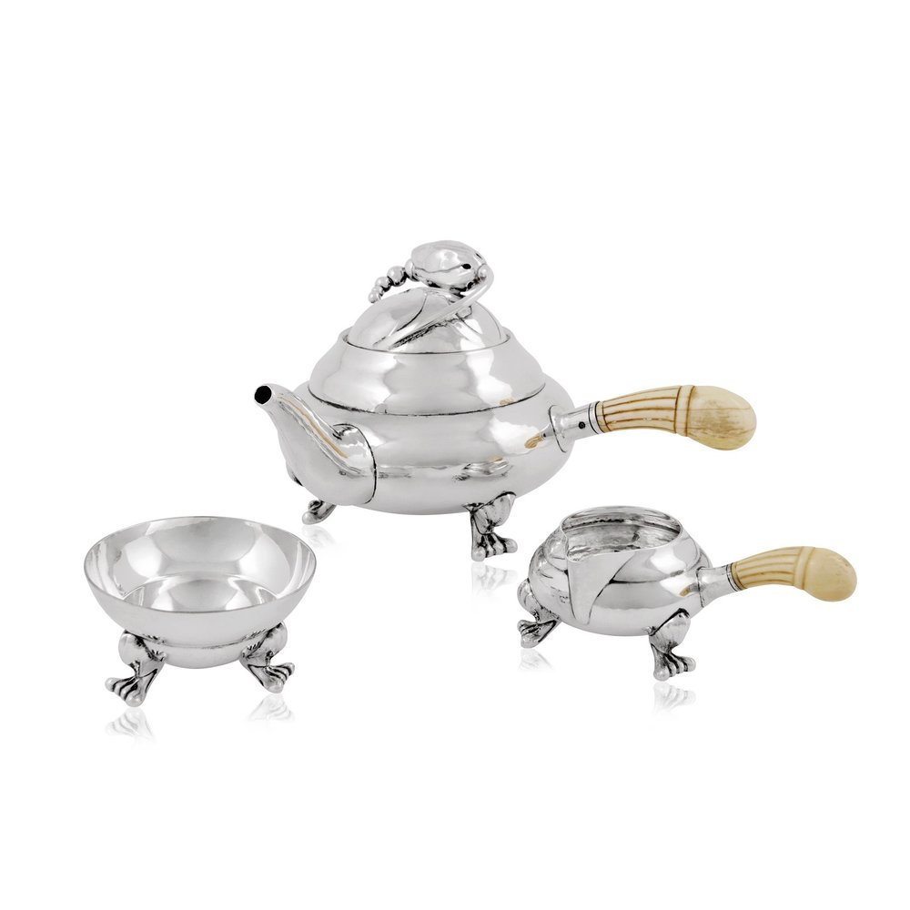 A STERLING SILVER BLOSSOM THREE PIECE "BUTLER" TEA SET, BY GEORG JENSEN