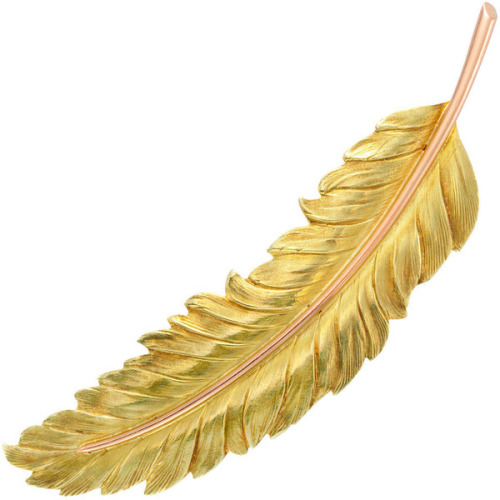 A YELLOW AND ROSE GOLD HAIR CLIP