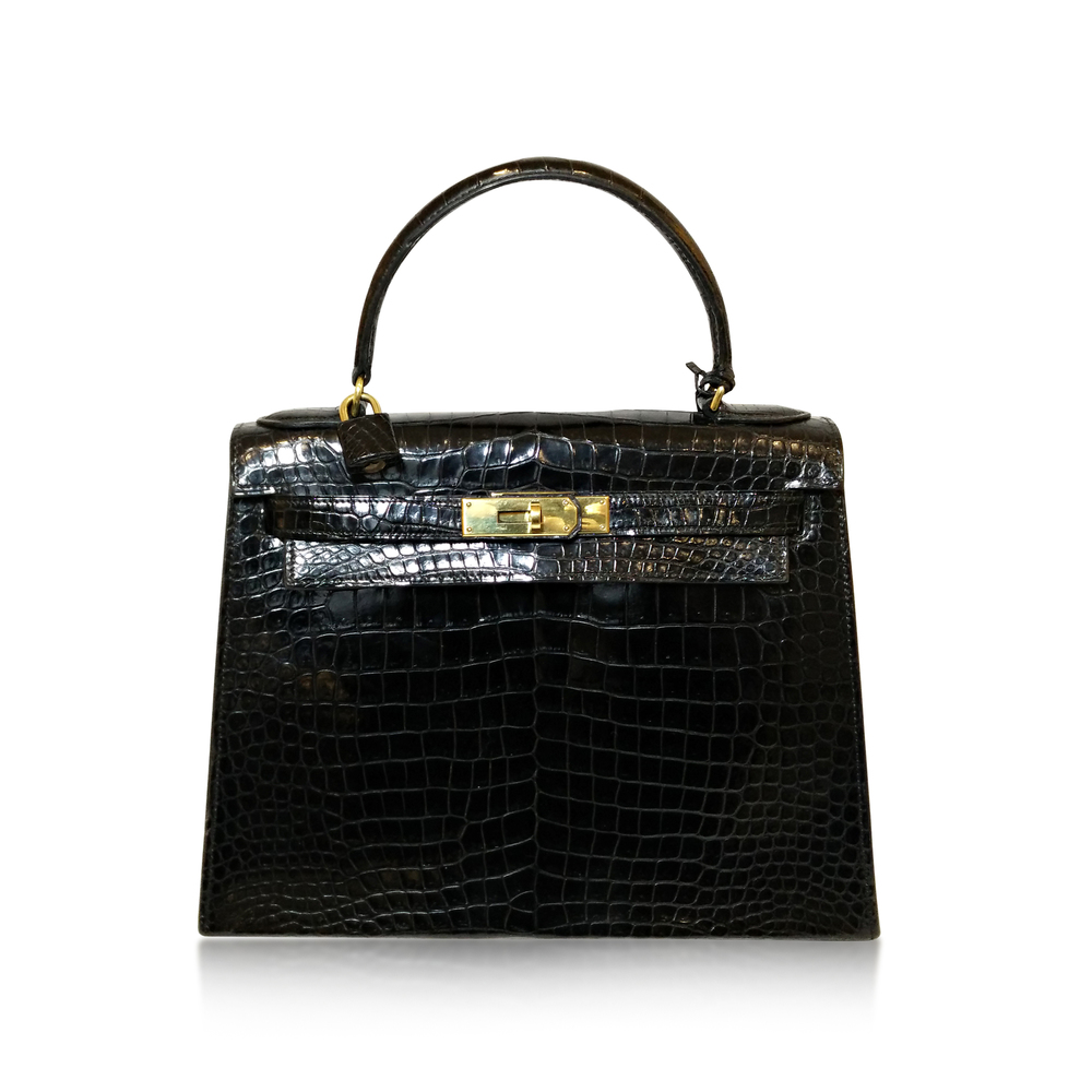 A RETRO BLACK POROSUS CROCODILE KELLY BAG, BY HERMES, CIRCA 1960S  