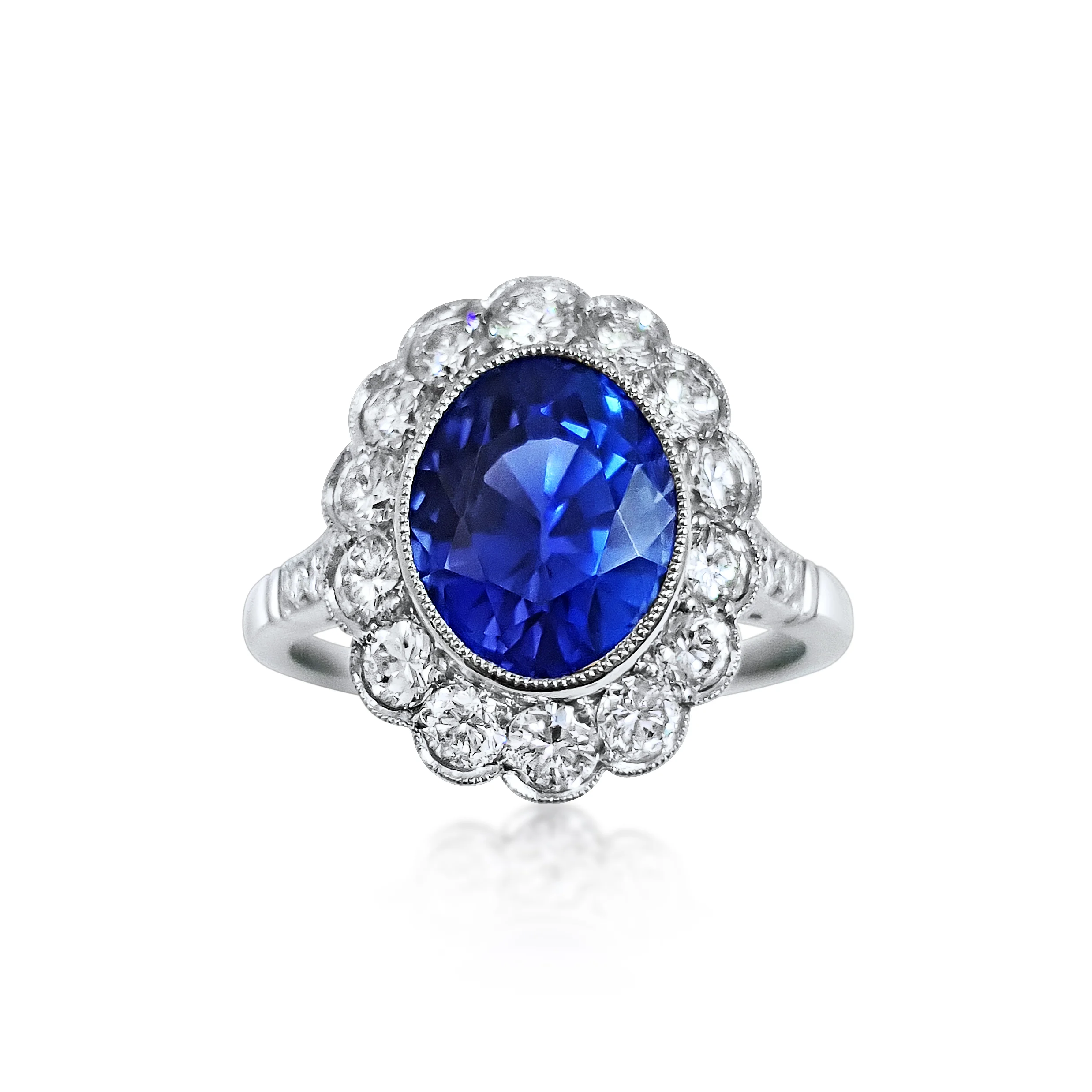 An Oval Cut Sapphire and Diamond Ring  