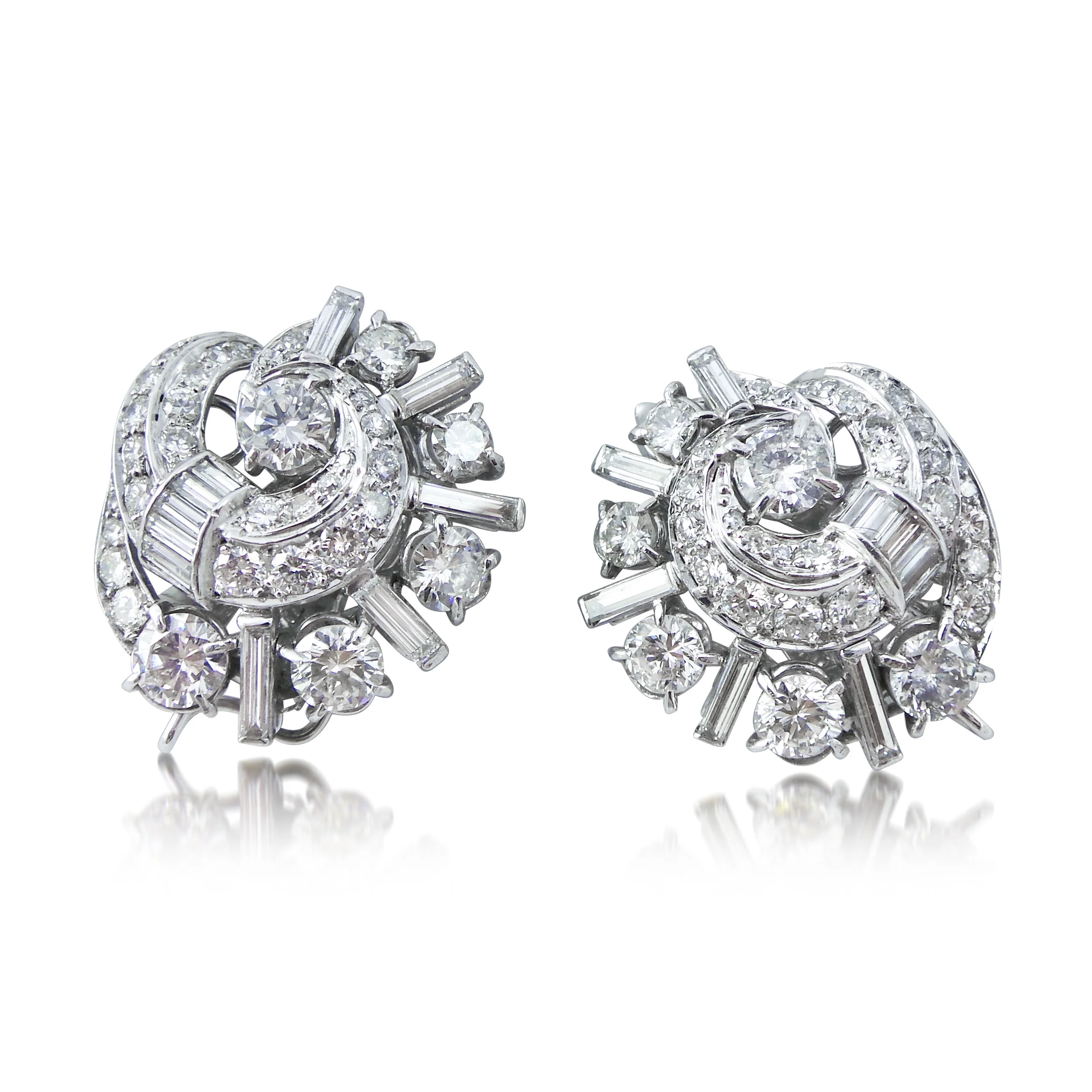A Pair of Retro Diamond and Platinum Earclips, circa 1950’s - Sold