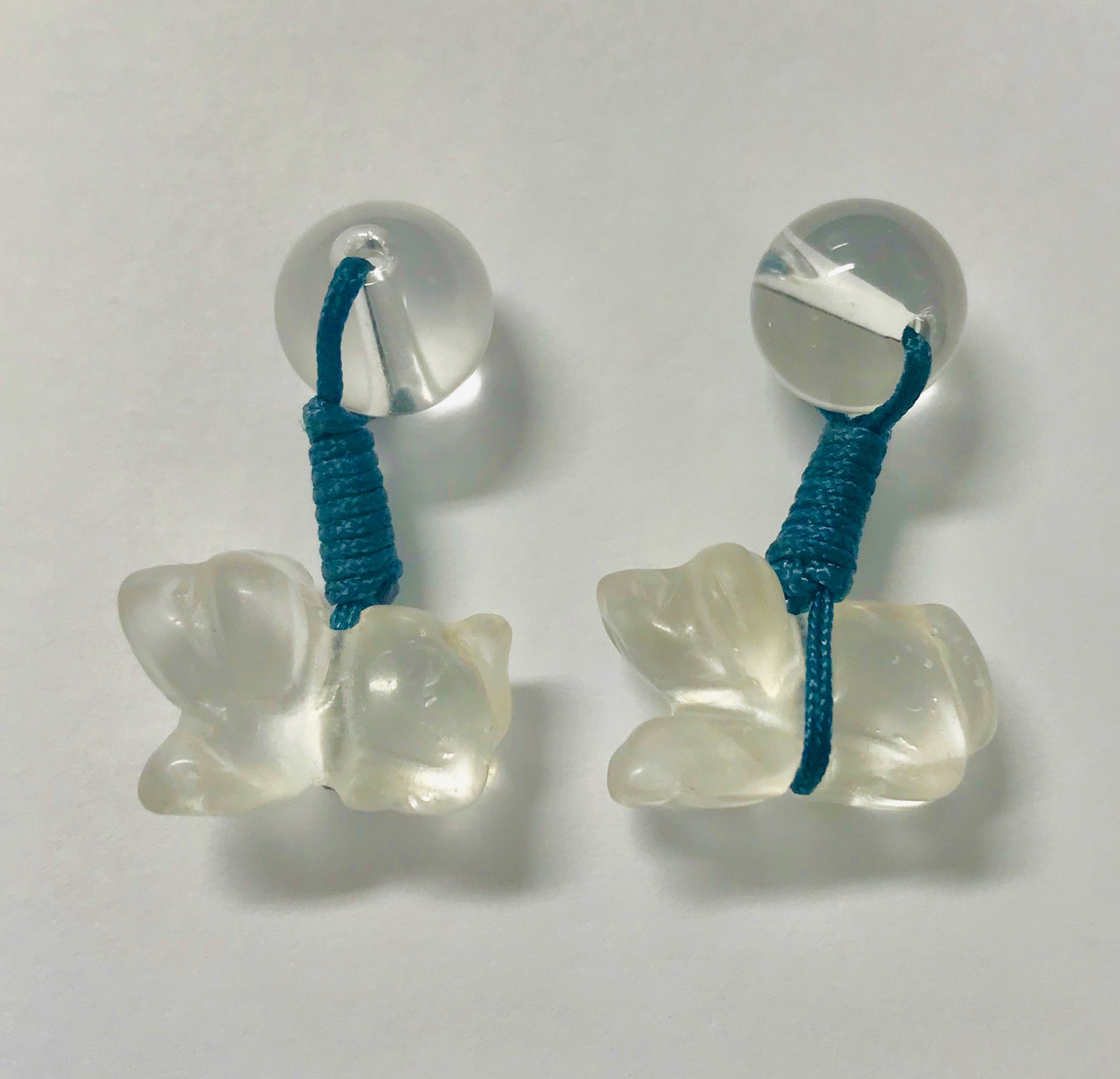 A Pair of Glass Dog Cufflinks 