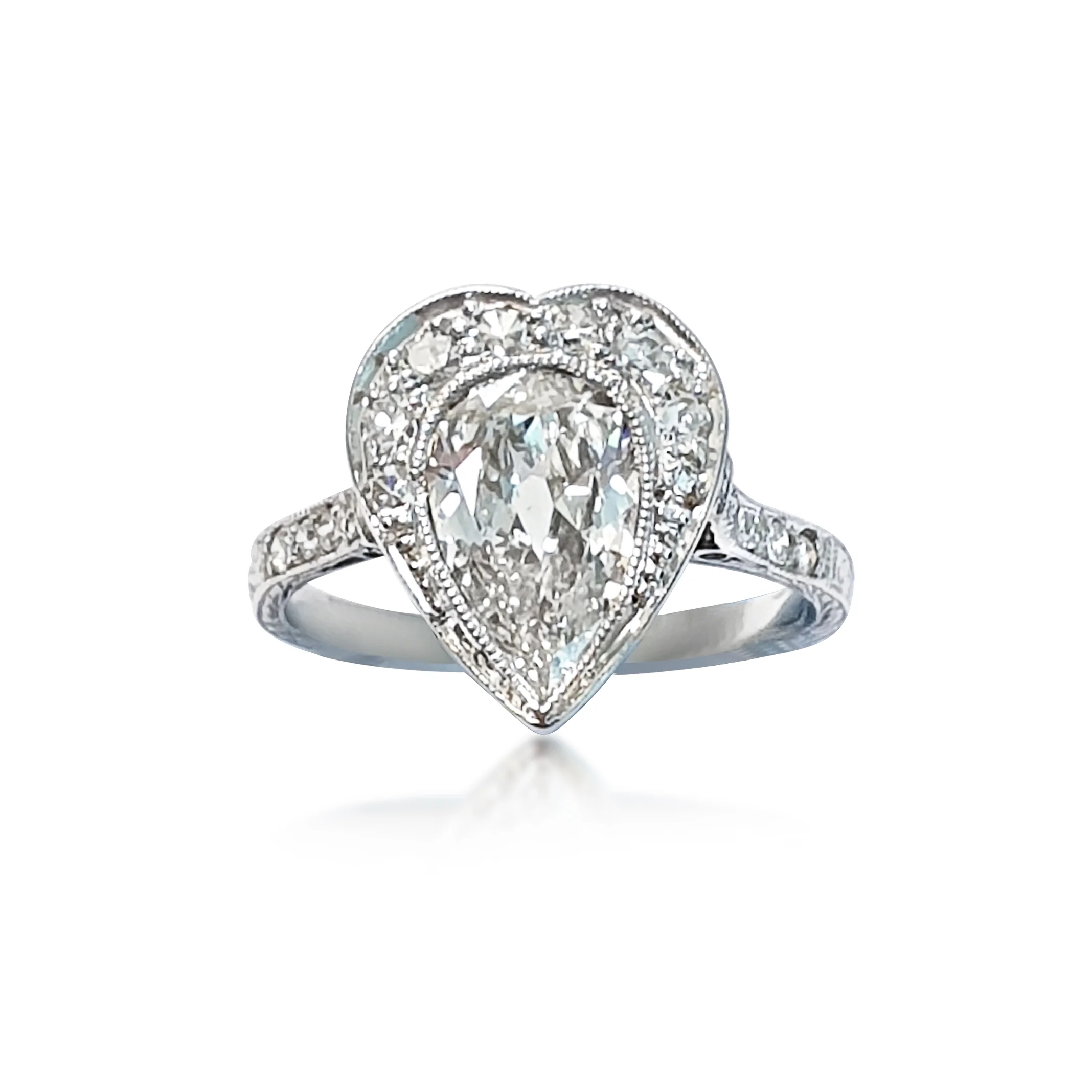  An Edwardian 1.45 CTW Diamond Platinum Heart Ring