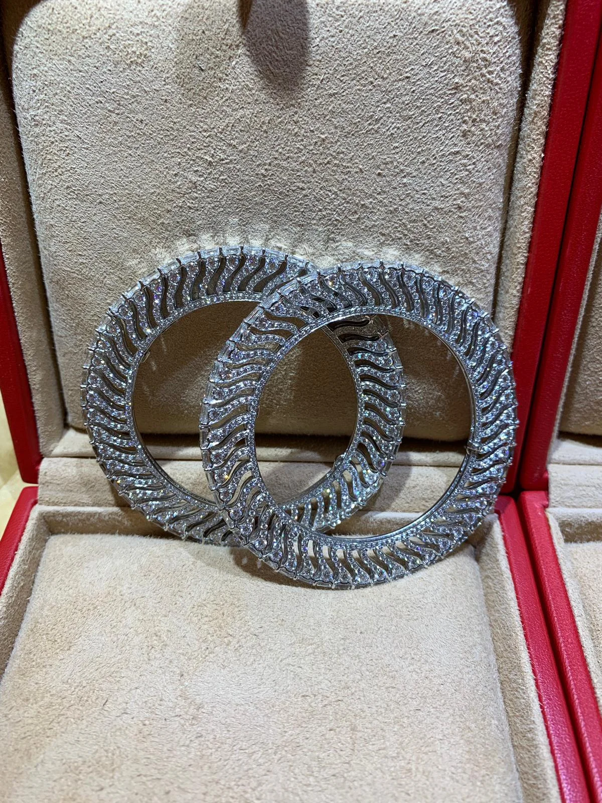 A Pair of Diamond Bangles, by Bhagat (Private Collection)