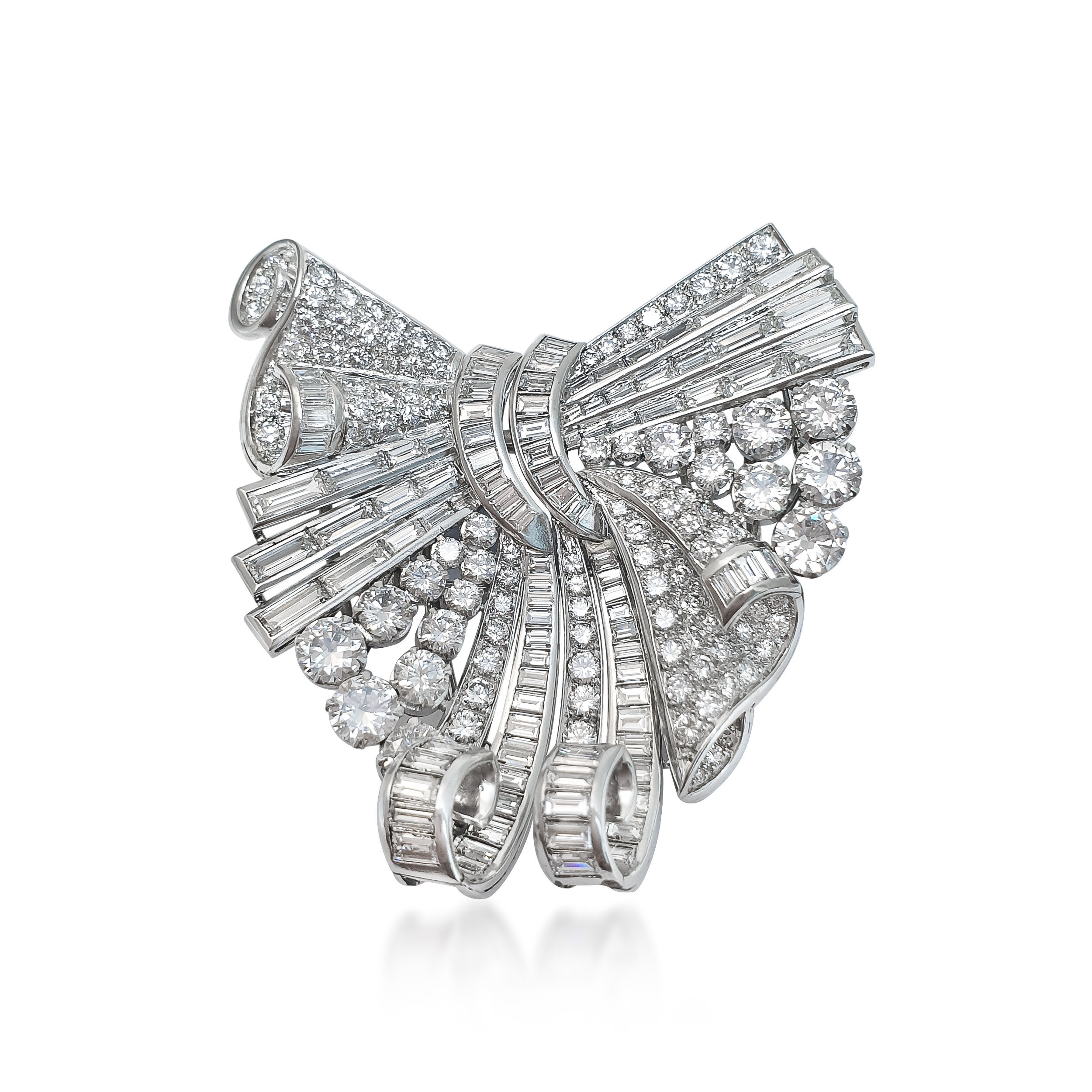 A Platinum and Diamond Bow Double-Clip Brooch, by Boucheron