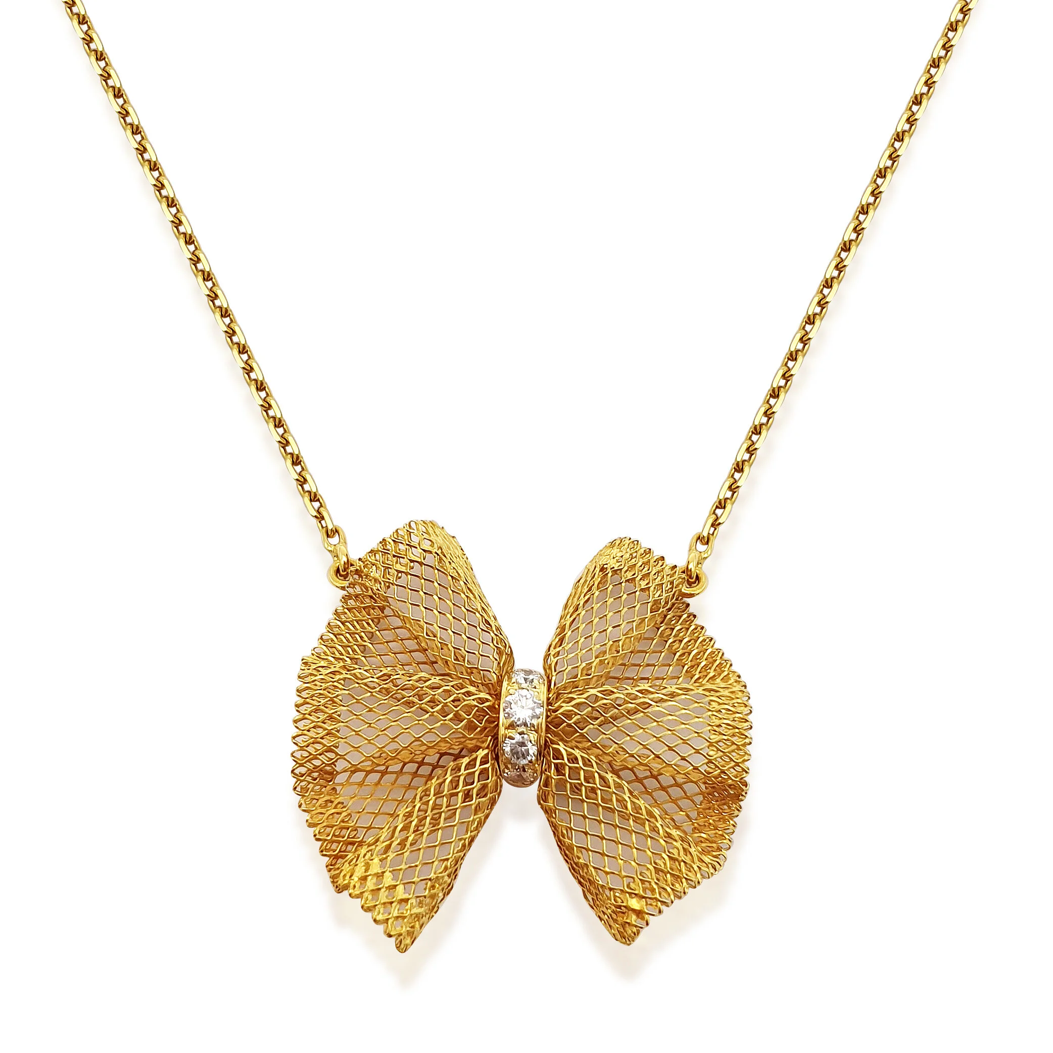A Yellow Gold and Diamond Ribbon Lace Pendant Necklace, by Van Cleef &amp; Arpels 