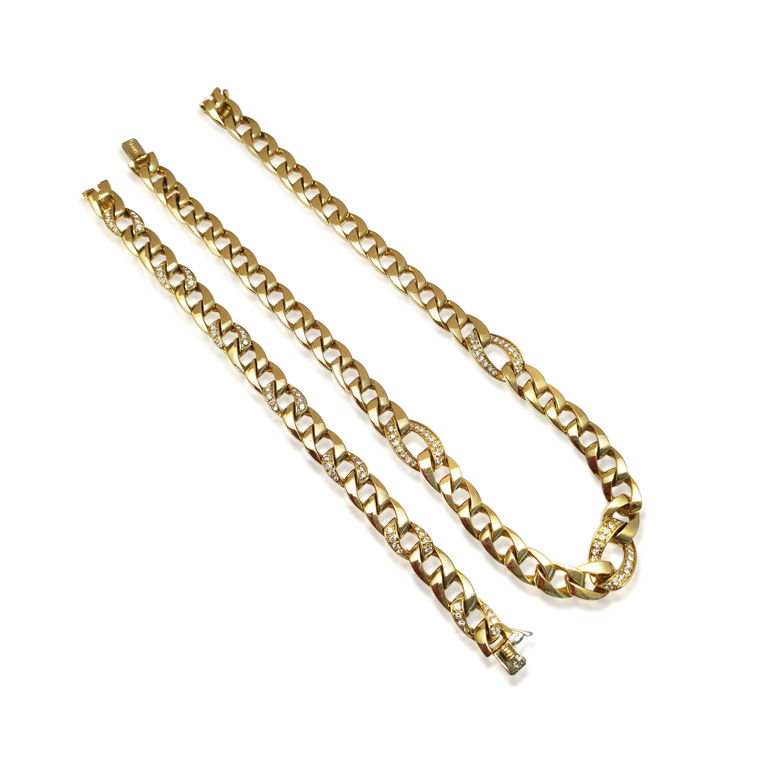 JS036:200902 A Gold and Diamond Demi-Parure by Cartier.jpg