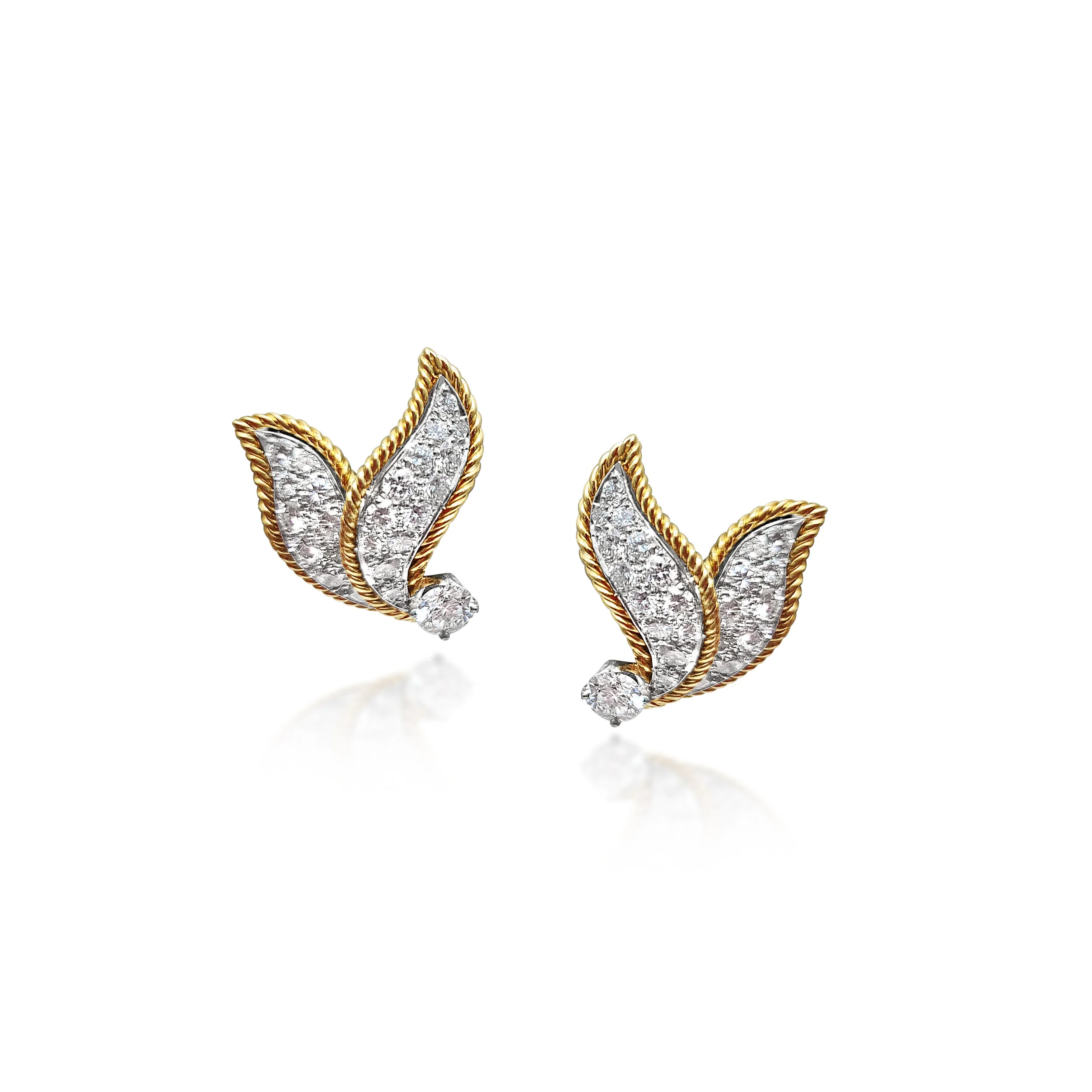 A Pair of Diamond Earclips, by Van Cleef &amp; Arpels               