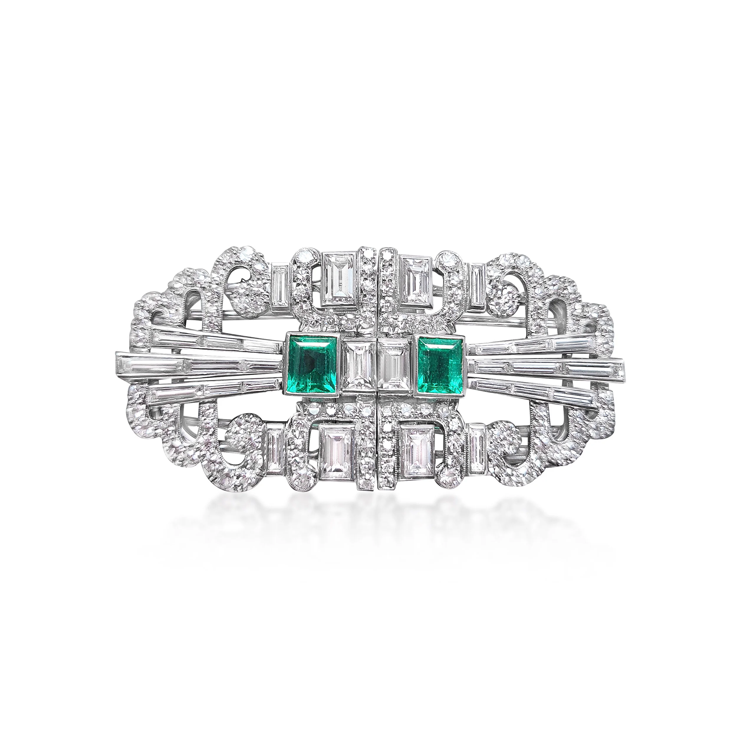 An Art Deco Diamond and Emerald Double Clips