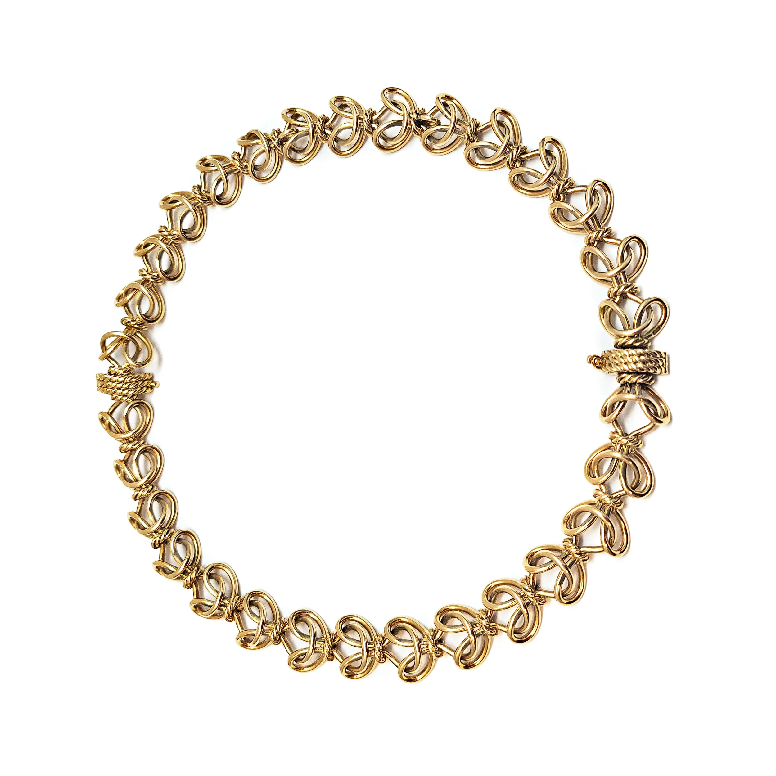 An 18K Gold Necklace / Bracelets, by Boucheron