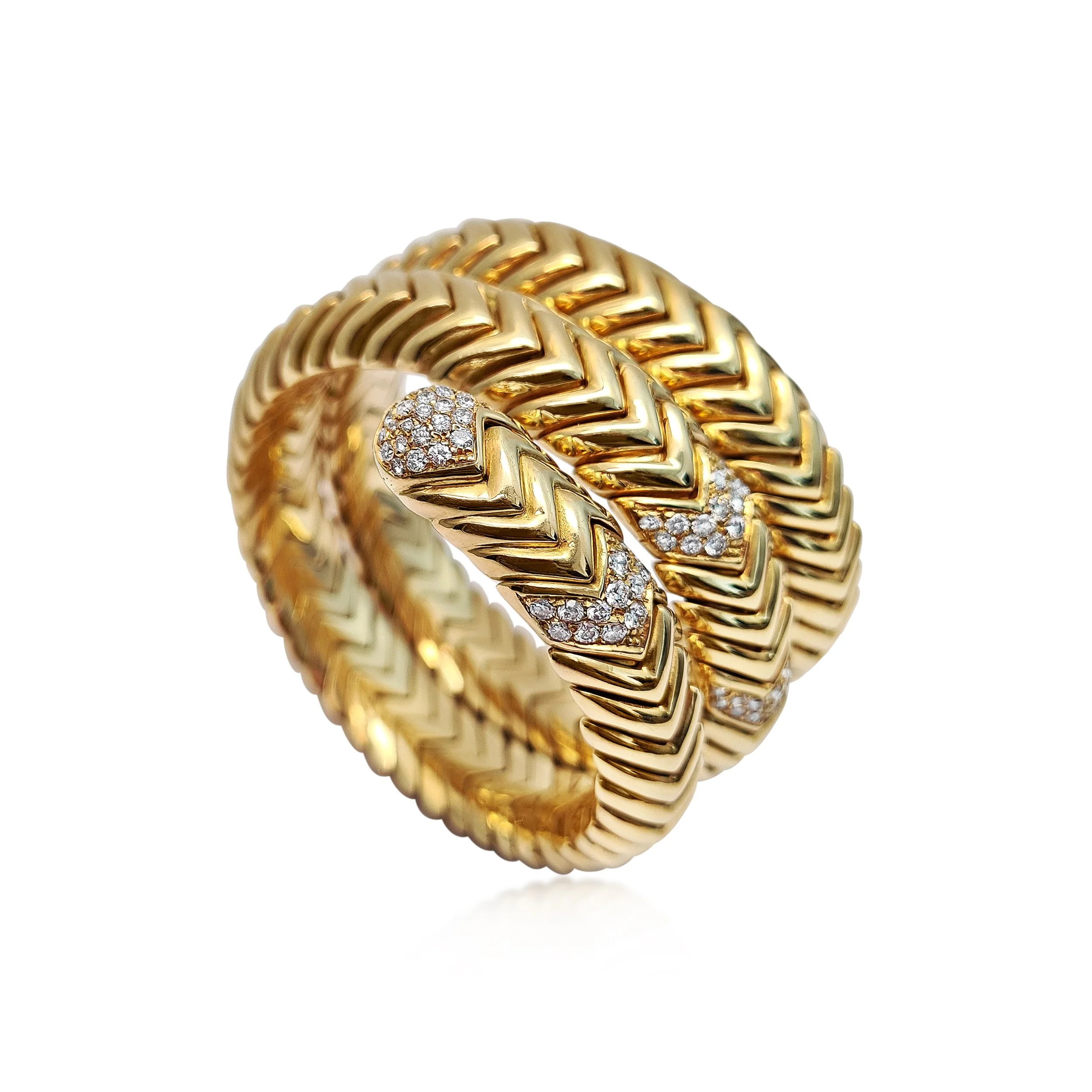 An 18K Yellow Gold and Diamond Bracelet, by Bulgari.