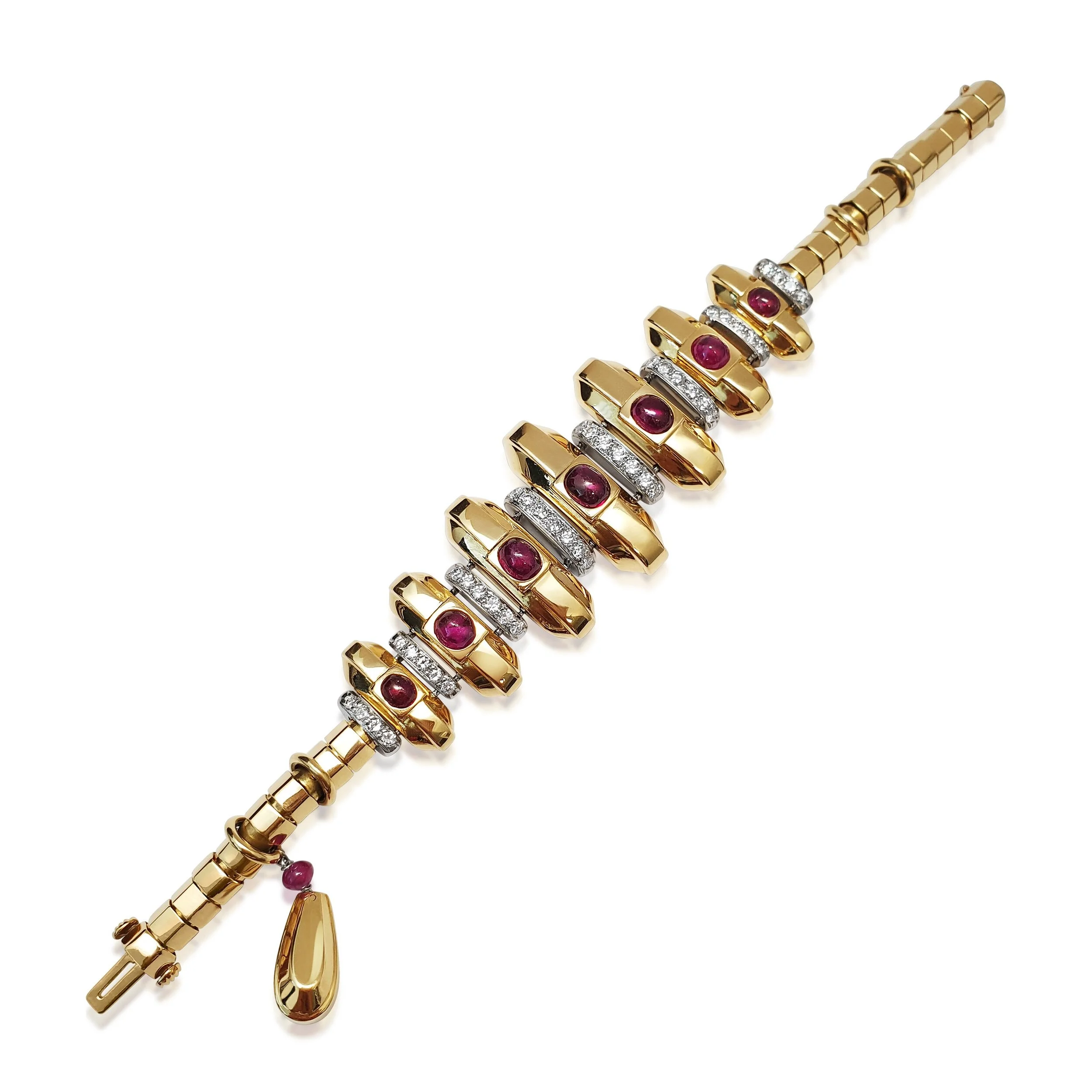 An 18K Gold and Cabochon Ruby Bracelet, attributed to Oscar Heyman