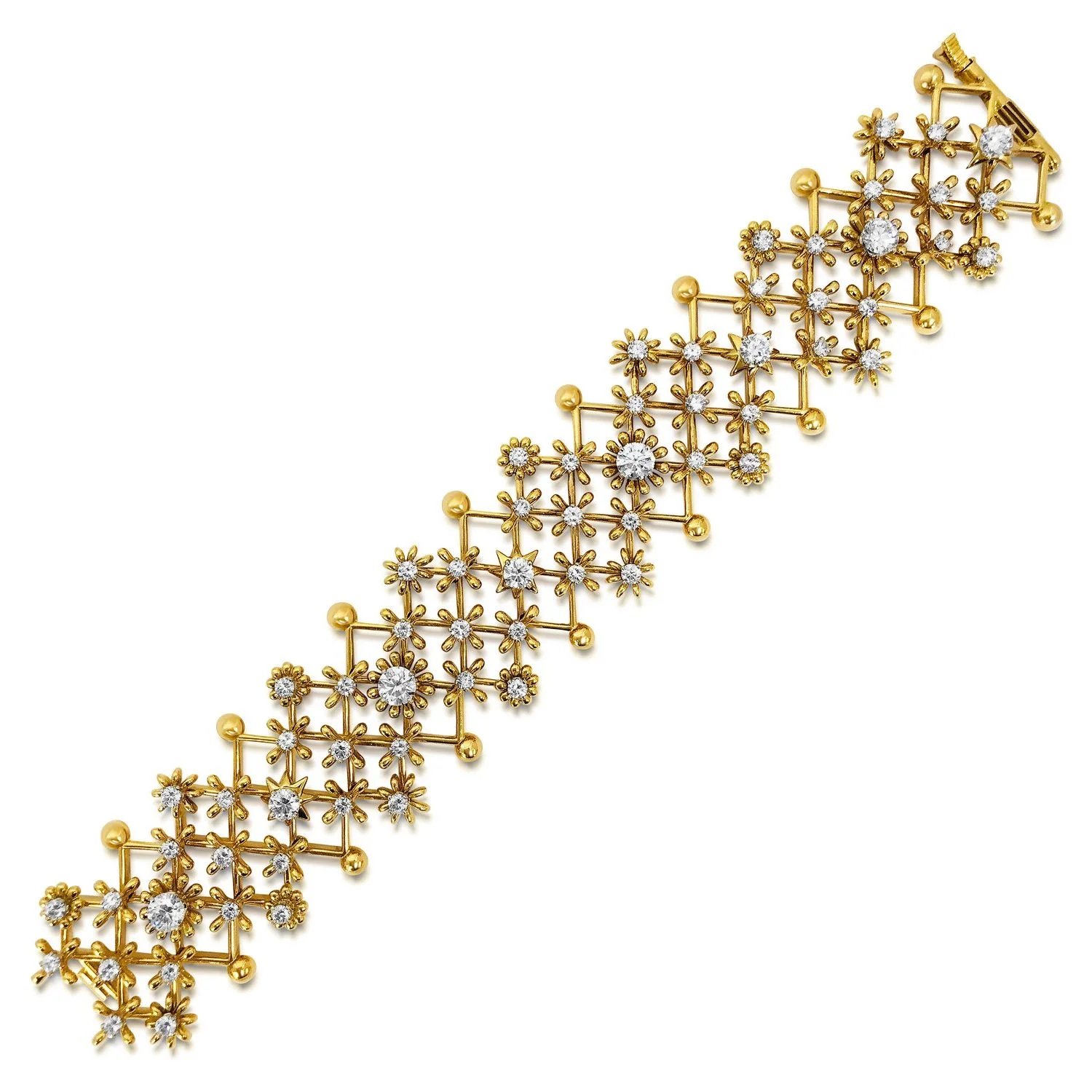 AN 18K YELLOW GOLD AND DIAMOND BRACELET, BY SCHLUMBERGER