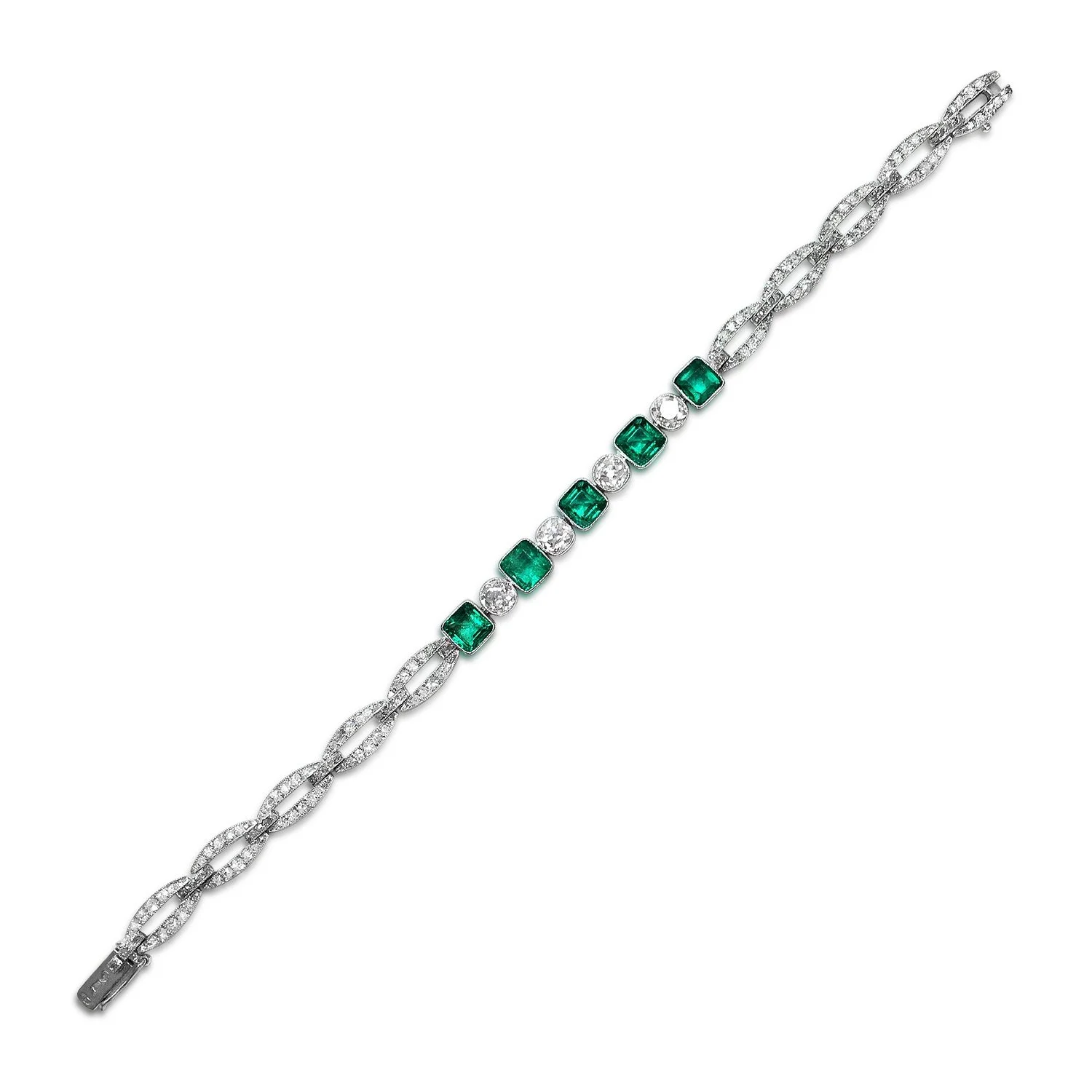 AN ART DECO DIAMOND AND EMERALD BRACELET