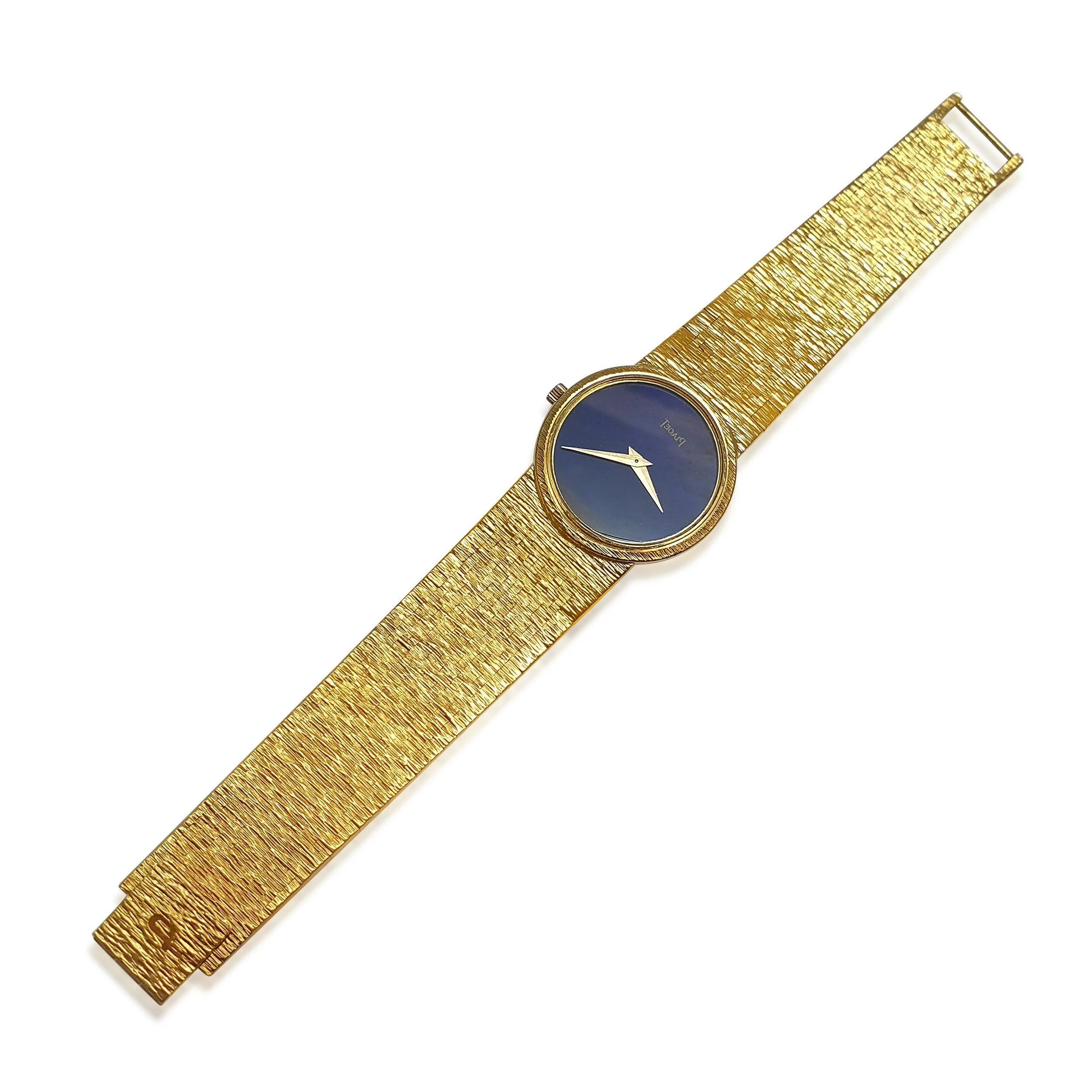 A Gold and Lapis Watch, by  Piaget