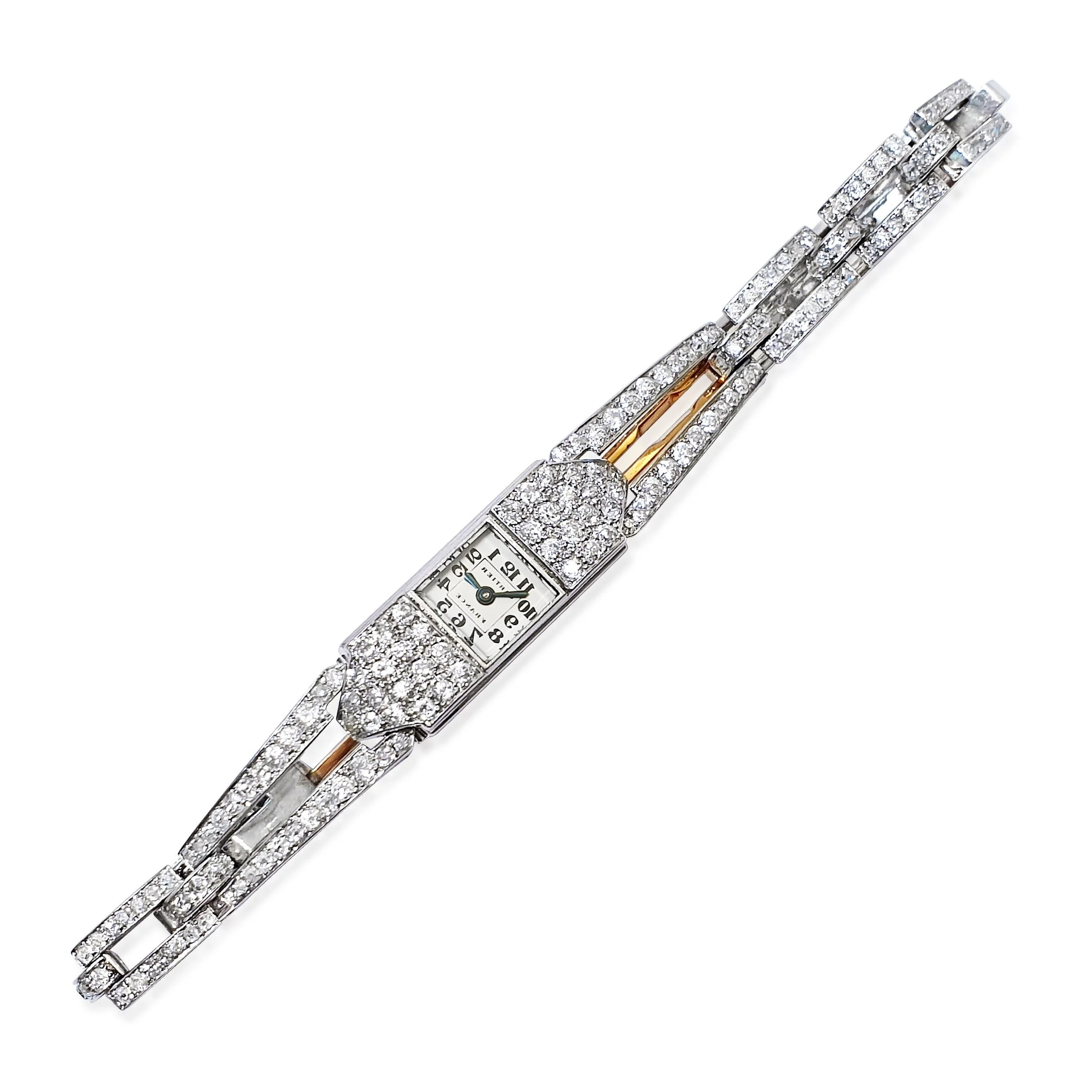 An Art Deco Diamond and Platinum Watch, by Cartier, circa 1920s