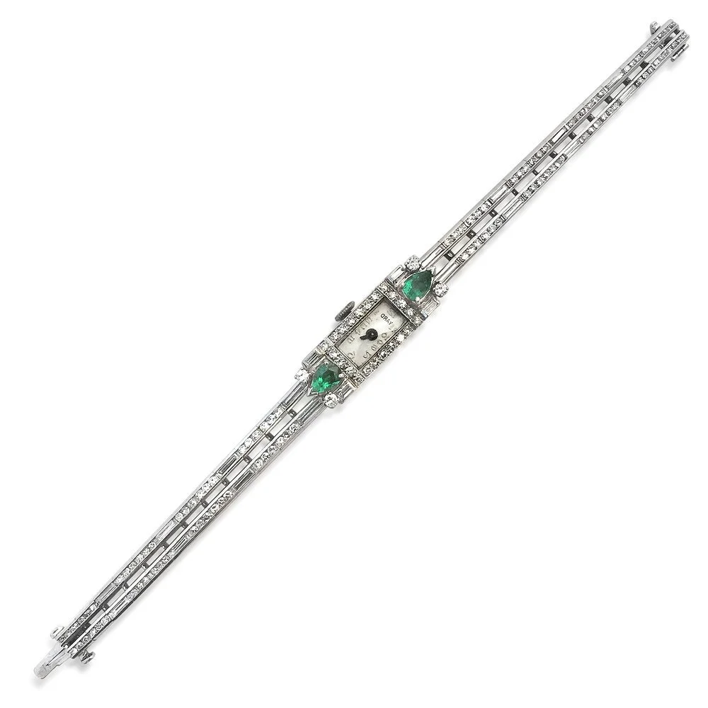A Emerald, Diamond and Platinum Ladies watch, by Raymond Yard