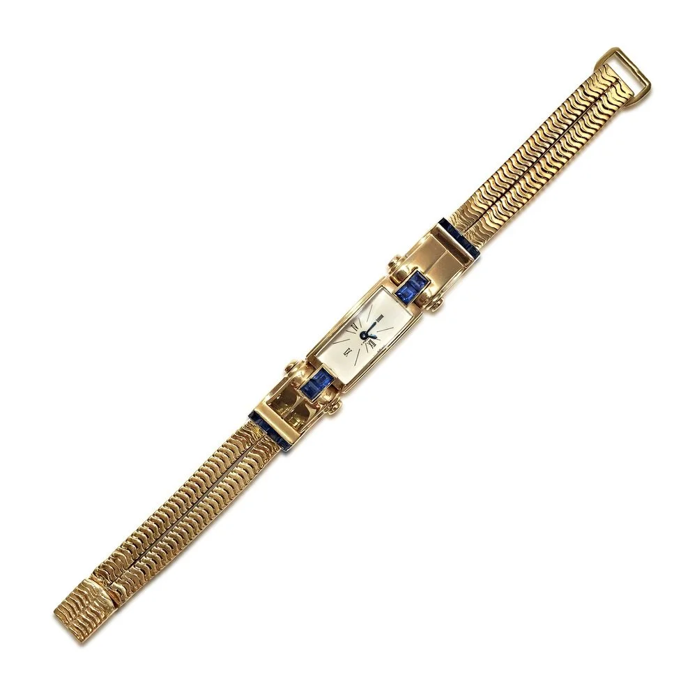 24210_FAE_RVJ+CO-111_A+Gold+and+Sapphire+Drivers+Watch+by+Cartier.jpg