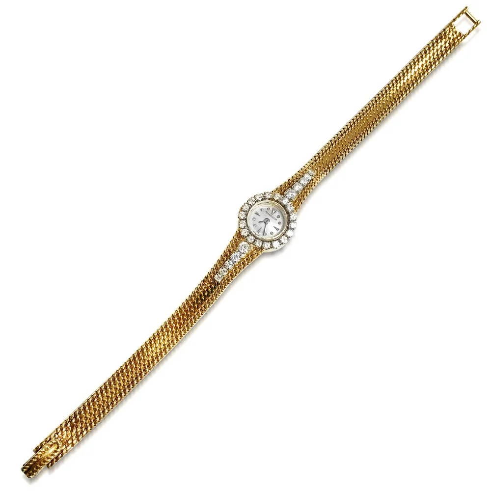 A Diamond and Gold Watch, by Jaeger Le Coultre
