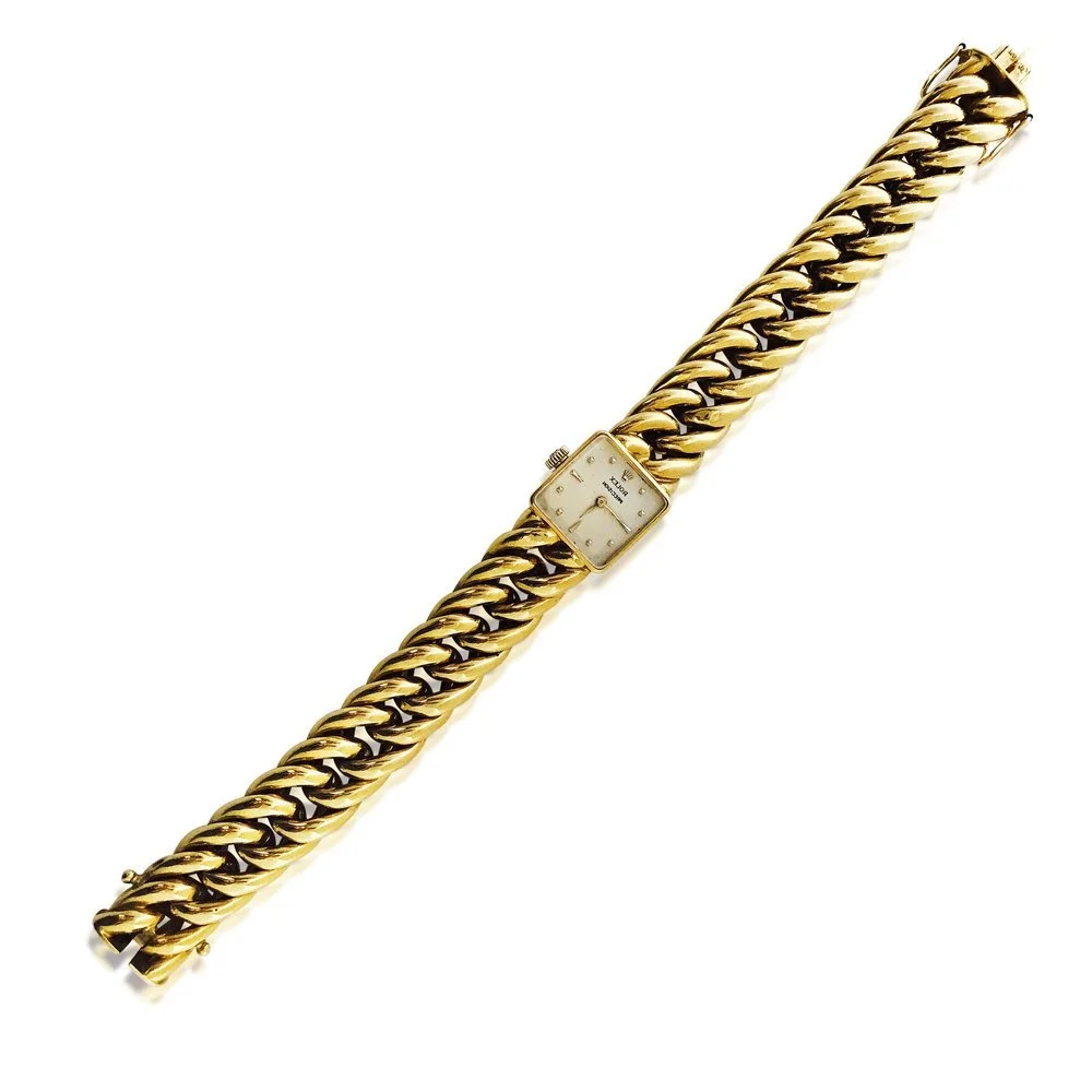 A 1940's Rolex Gold Chain Bracelet Watch