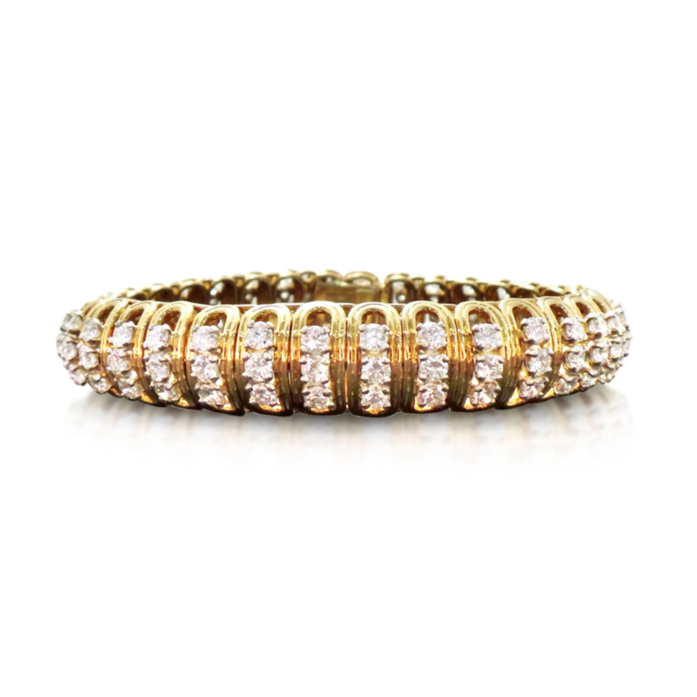 A GOLD AND DIAMOND BRACELET, BY BOUCHERON, CIRCA 1970