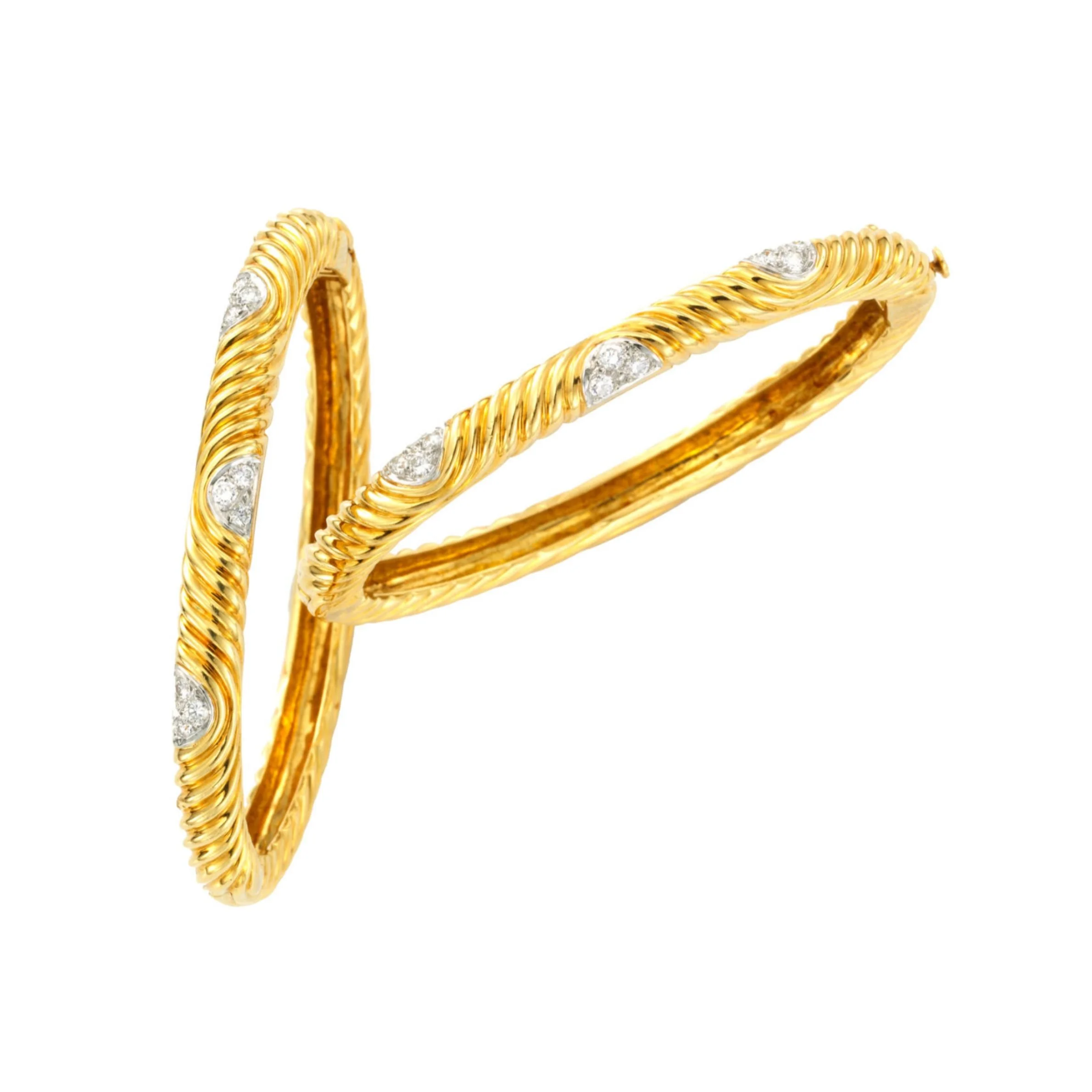 A PAIR OF 18K GOLD AND DIAMOND BANGLE BRACELETS, BY VAN CLEEF &amp; ARPELS