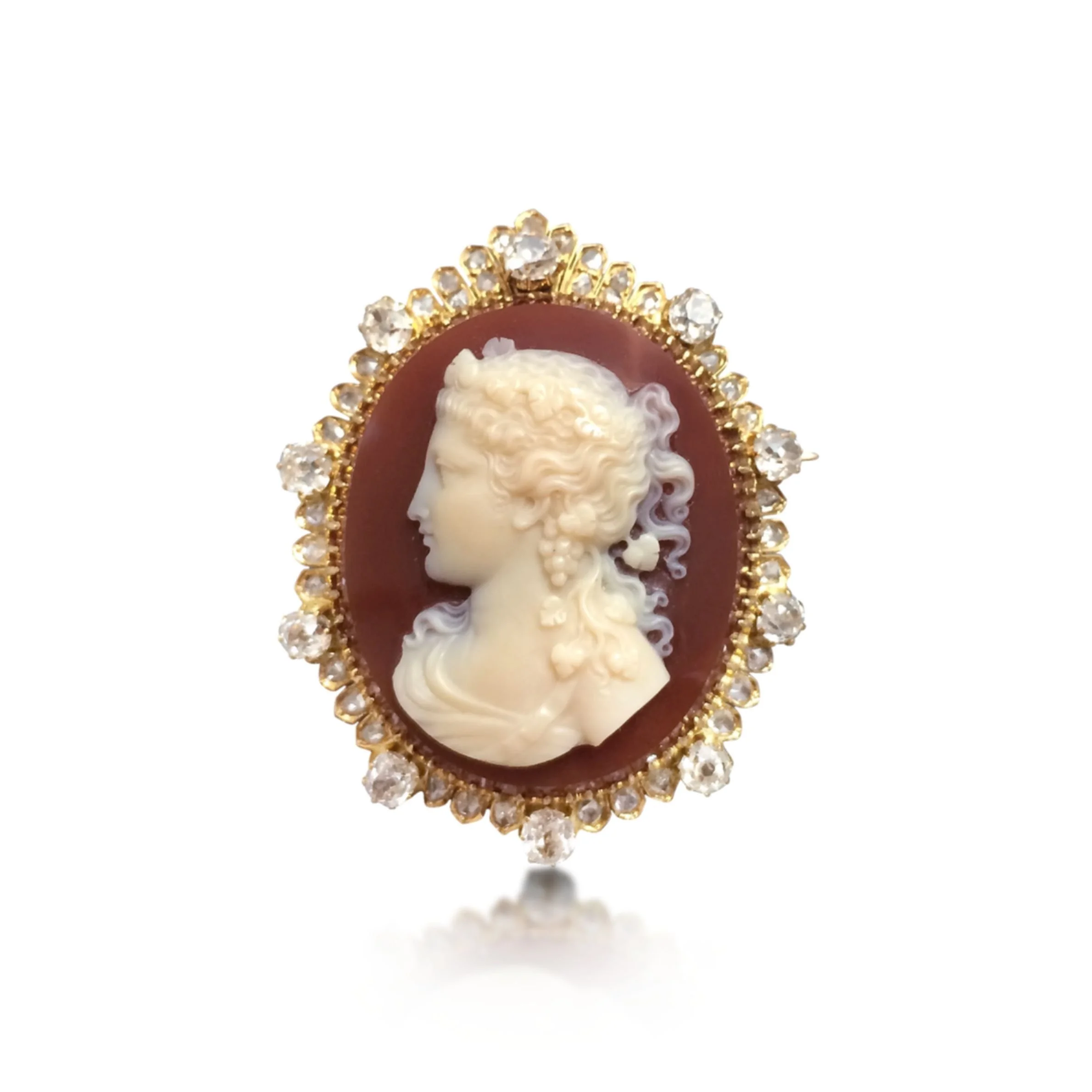 AN ANTIQUE HARDSTONE CAMEO AND DIAMOND BROOCH/PENDANT. CIRCA 1850S.