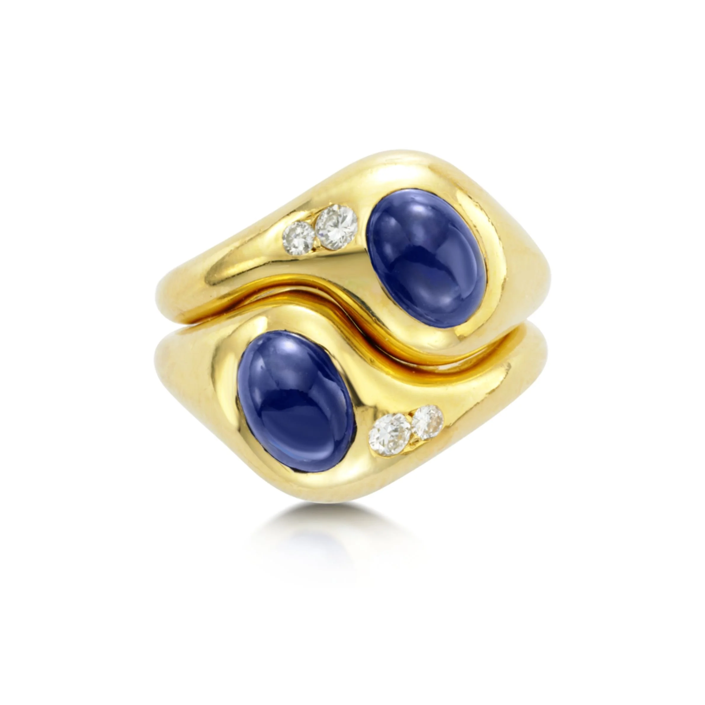 An 18K Gold, Cabochon Sapphire and Diamond "Lovers Knot" Ring, by Van Cleef and Arpels, circa 1970s