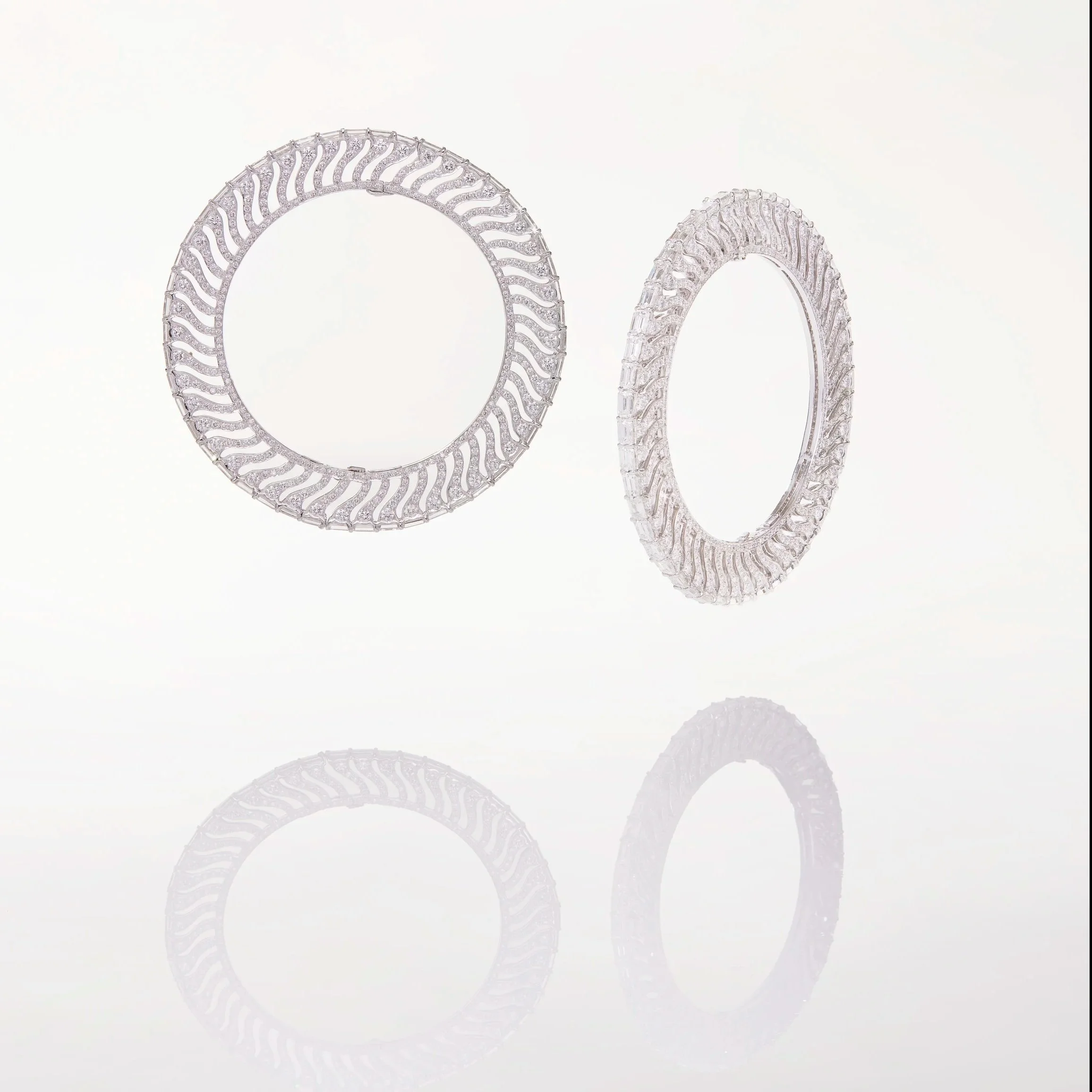 A Pair of Diamond Bangles, by Bhagat (Private Collection)