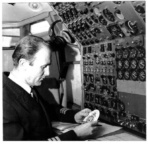 Boeing 707 Flight engineer with circular slide rule