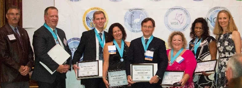 Mike Pafford, President with ESEPs: Peter Butziger, David Long, Robin Hershey, James Hubbell, Laurie Nasta, Vantresa Scott, and Courtney Wright, CSEP Acq. INCOSE Certification Manager